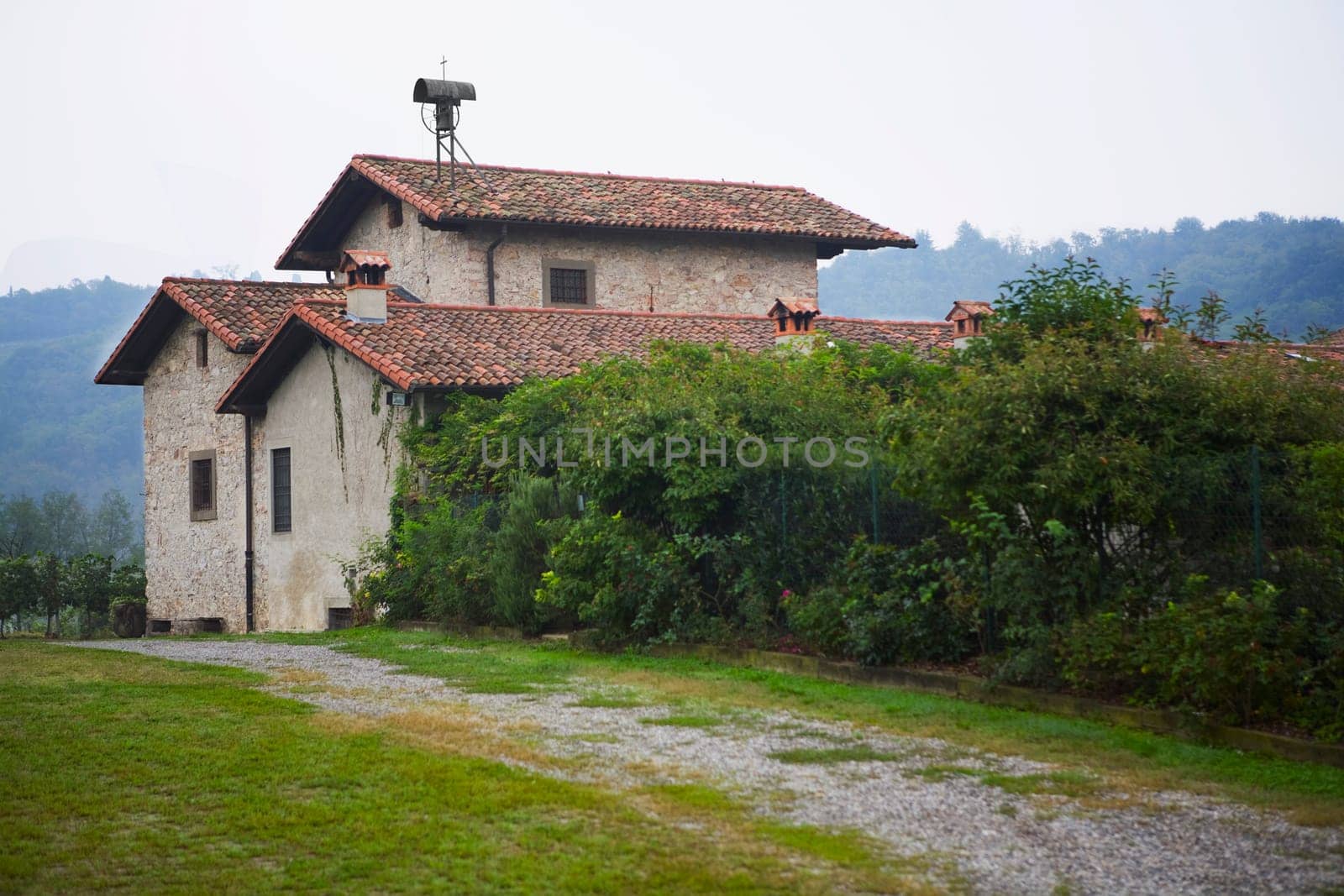 House at the roadside, Corte Franca, Brescia Province, Lombardy, Italy