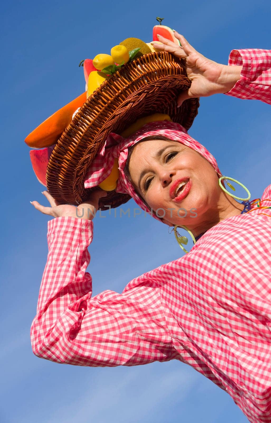 Low angle view of a mature woman selling fruits