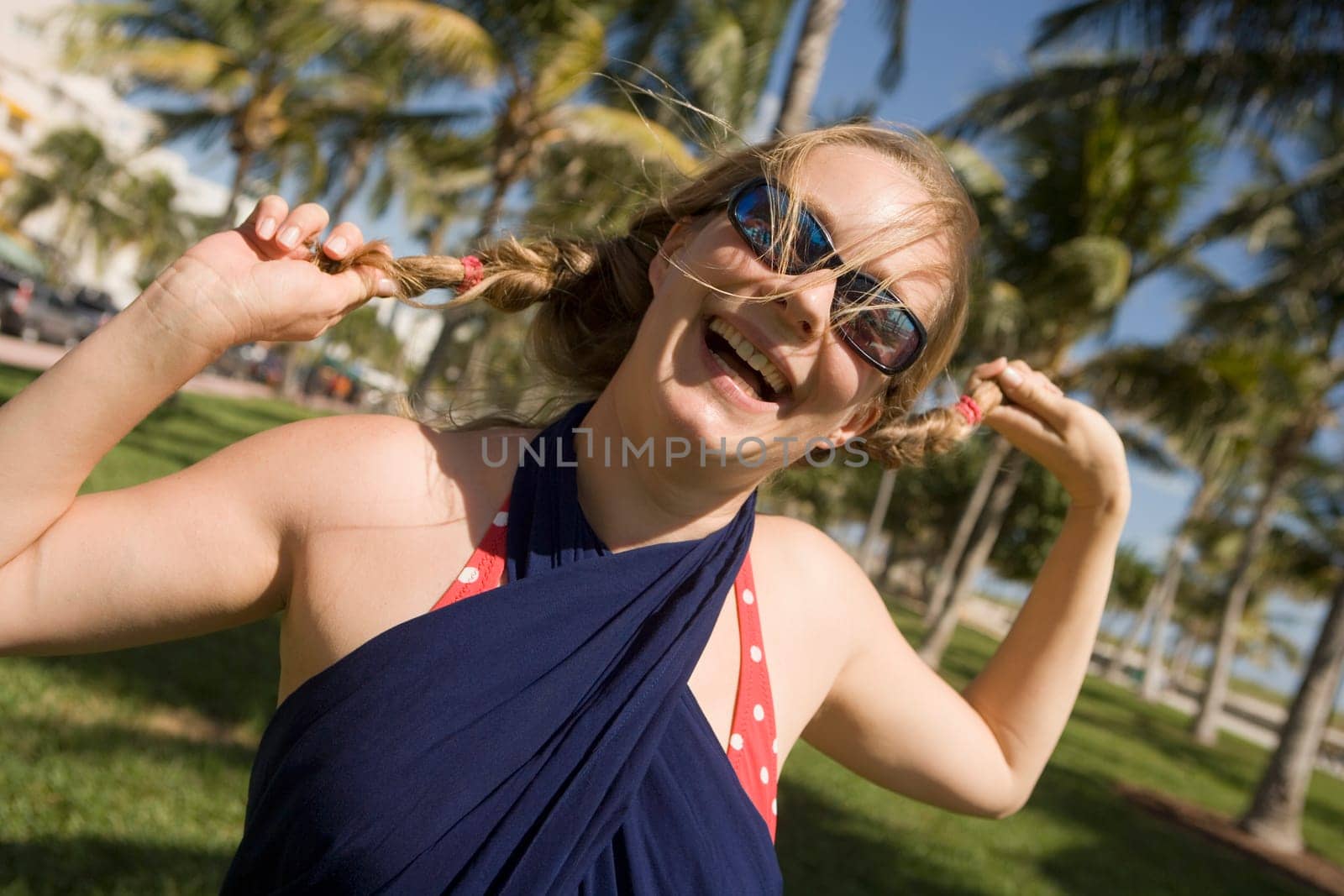 Close_up of a mid adult woman laughing