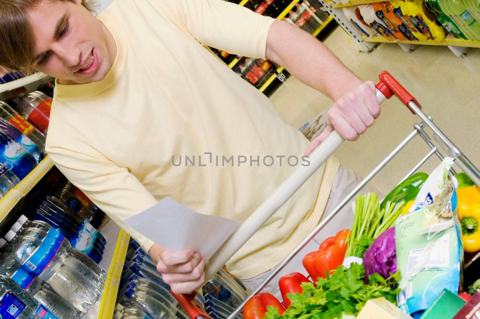 Man shopping in a supermarket
