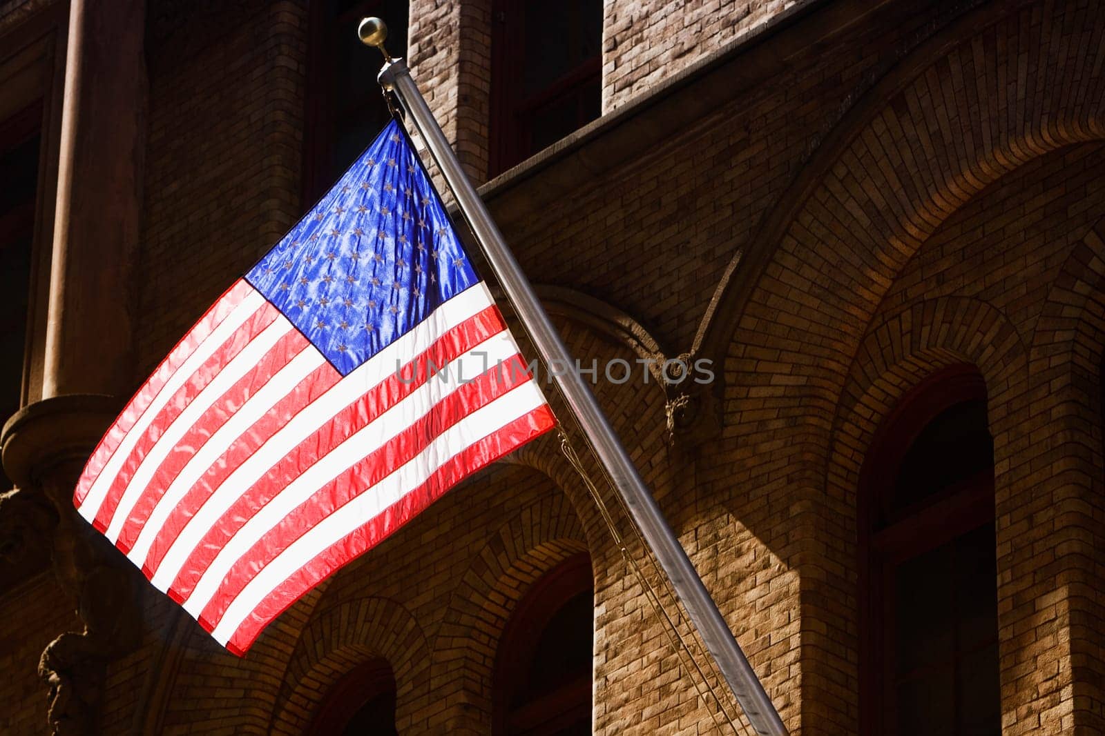 Low angle view of an American flag, New York City, New York State, USA