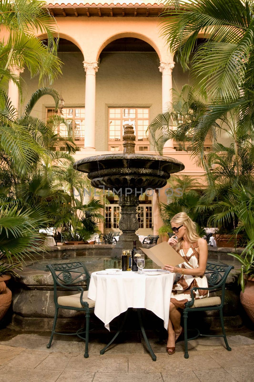 Woman holding menu cards, Biltmore Hotel, Coral Gables, Florida, USA