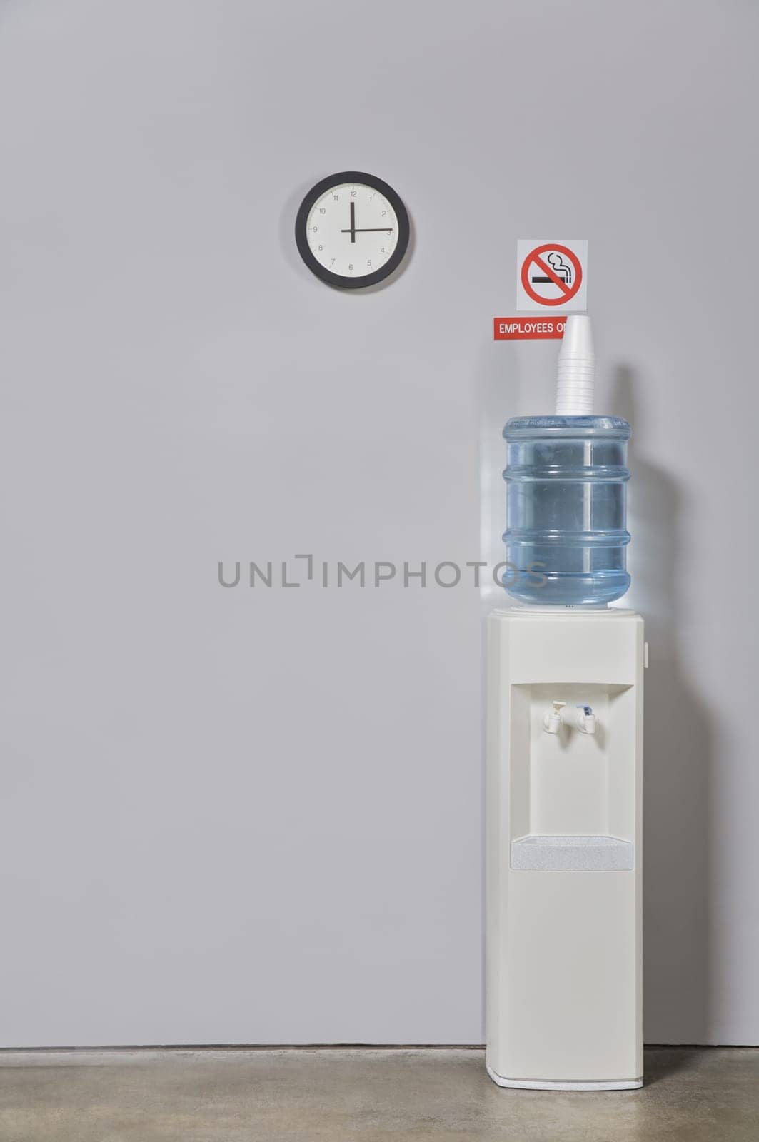 Water cooler near a wall