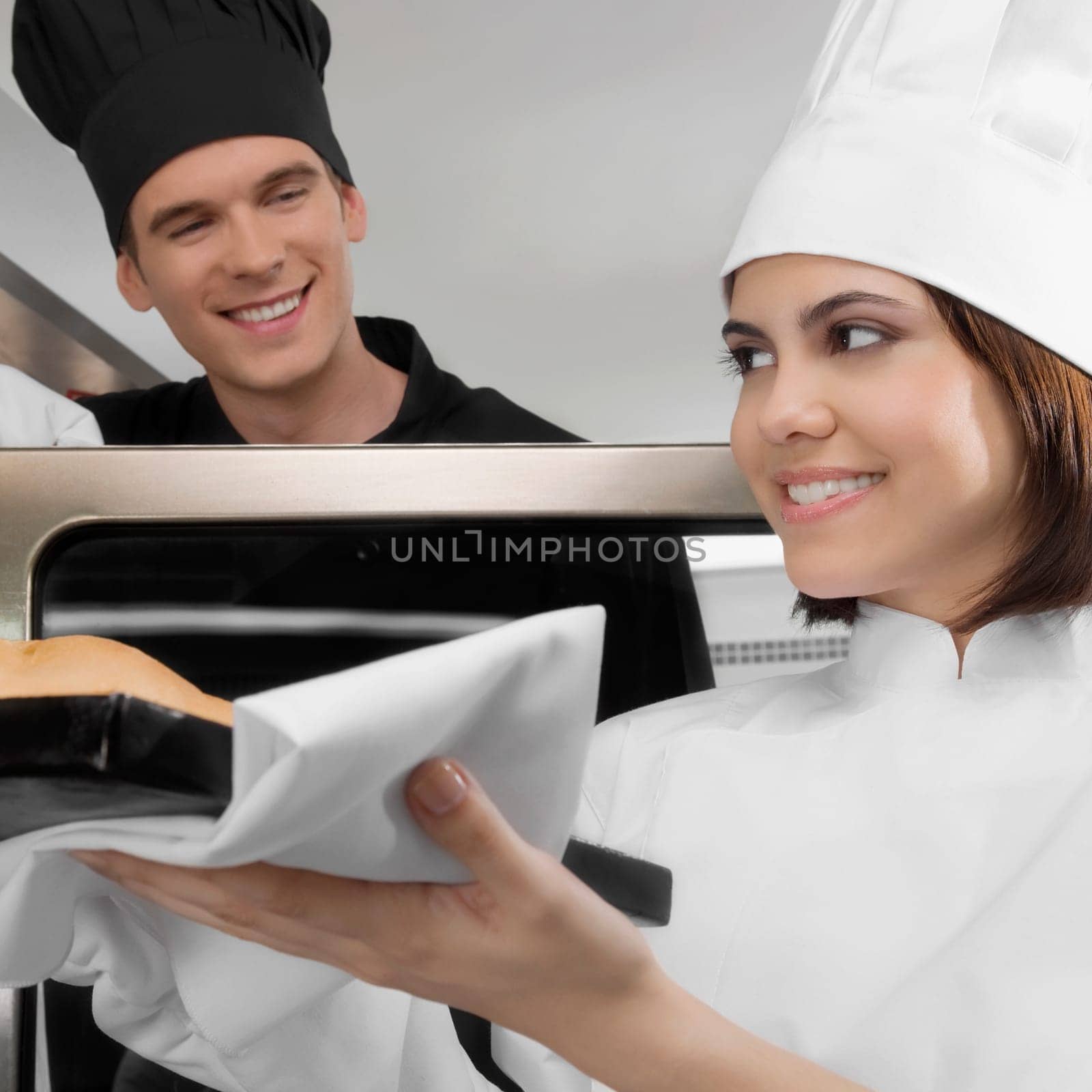 Chefs preparing food in the kitchen