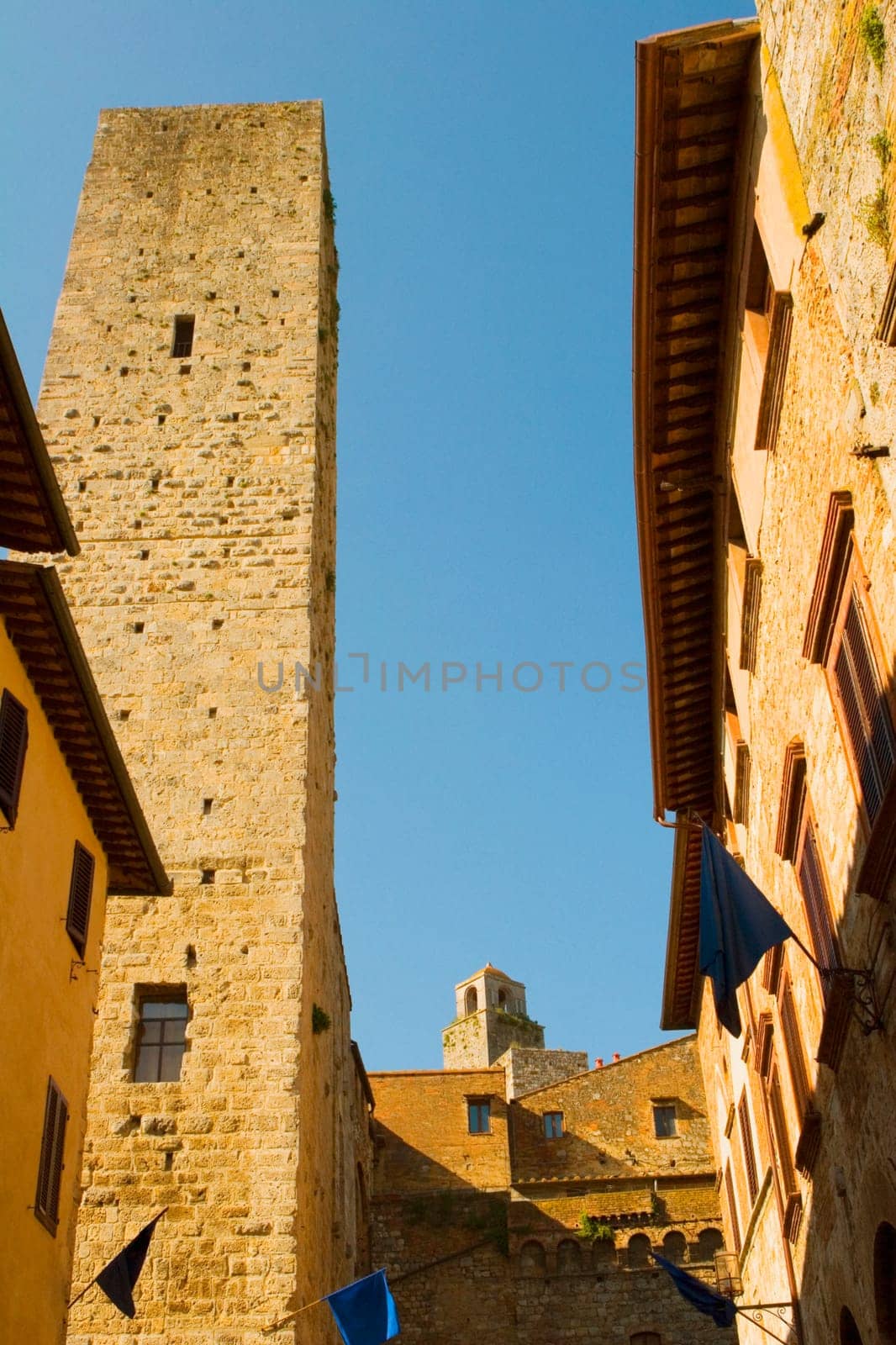 Low angle view of buildings in a city, Monteriggioni, Siena Province, Tuscany, Italy