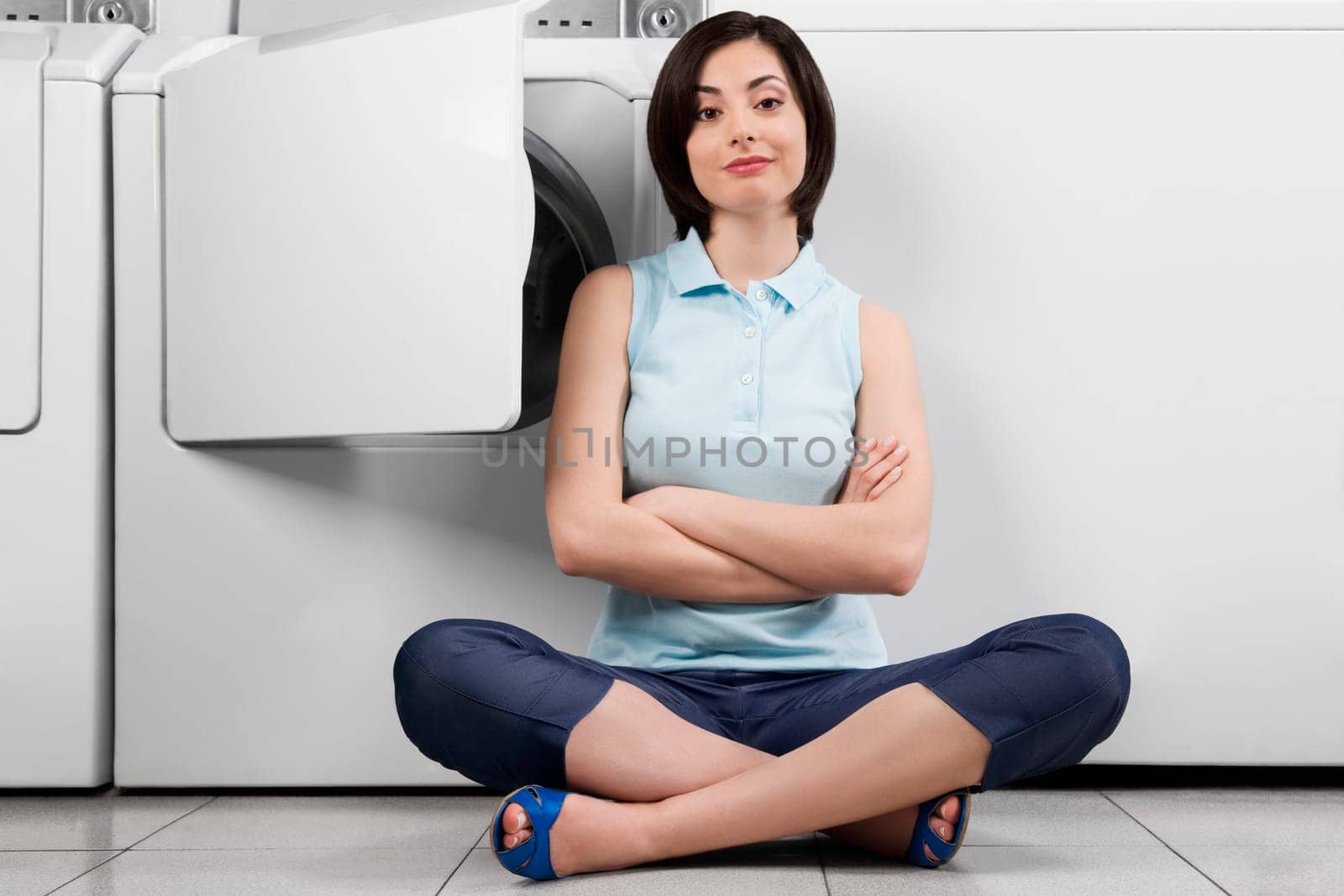 Woman in a laundromat