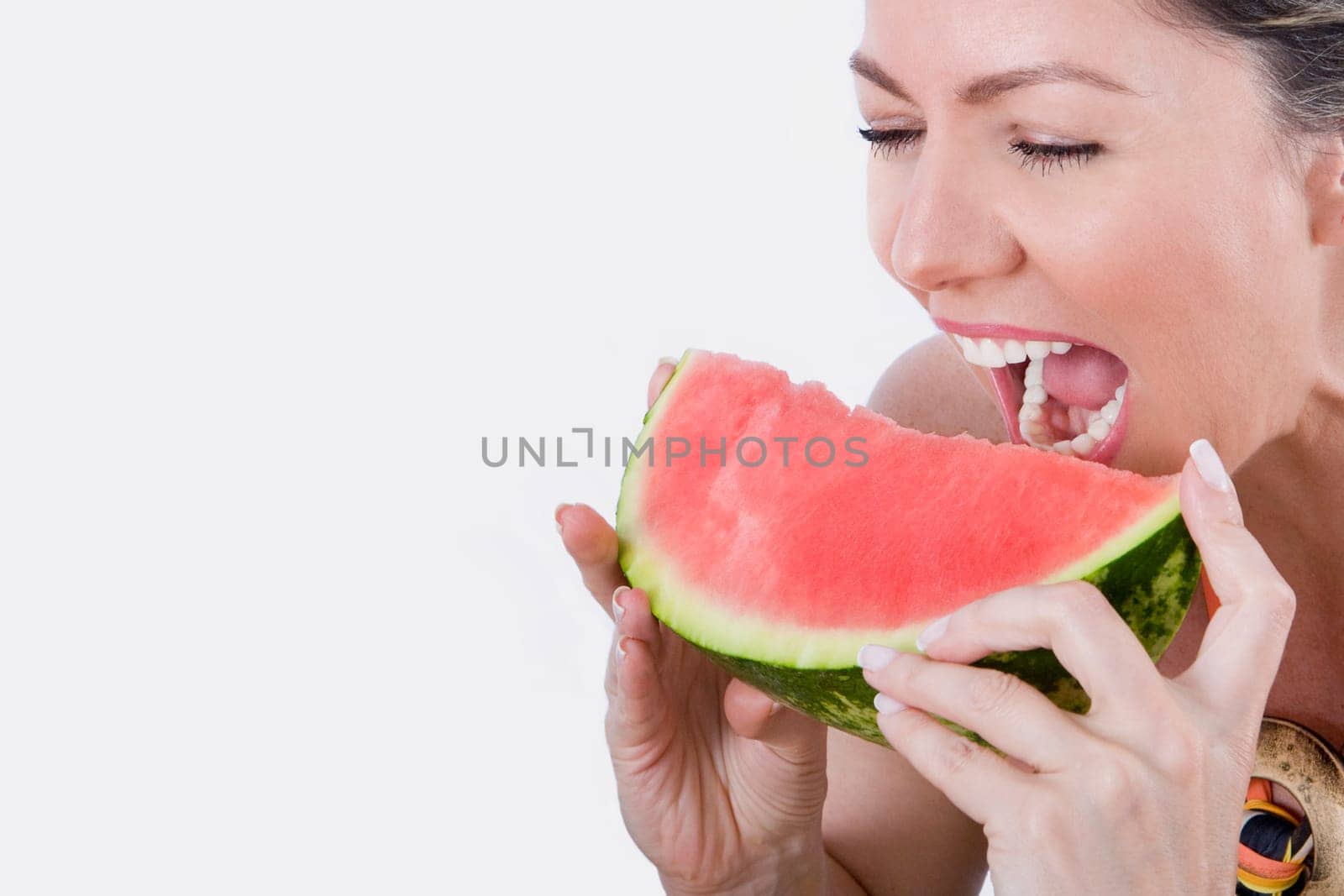 Woman eating watermelon