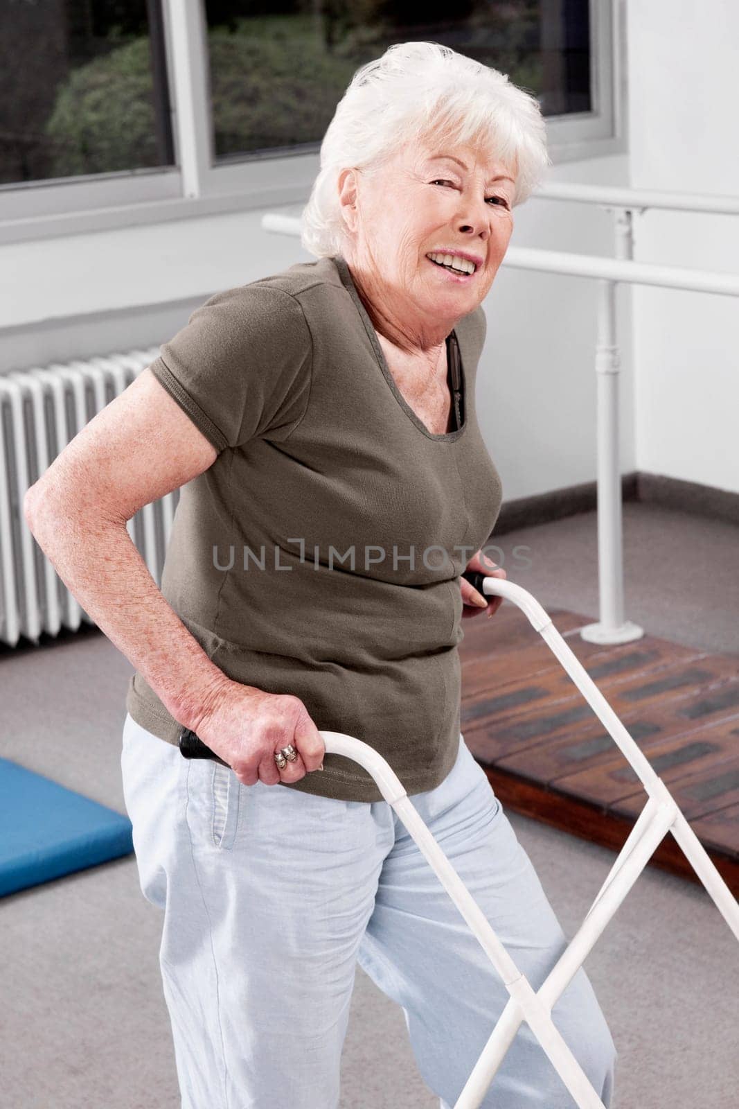 Disabled woman walking with a walker
