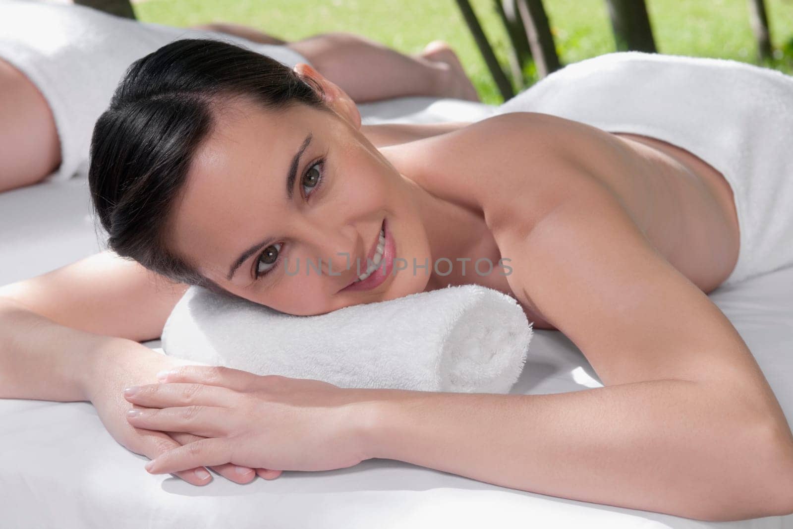 Woman lying on a massage table