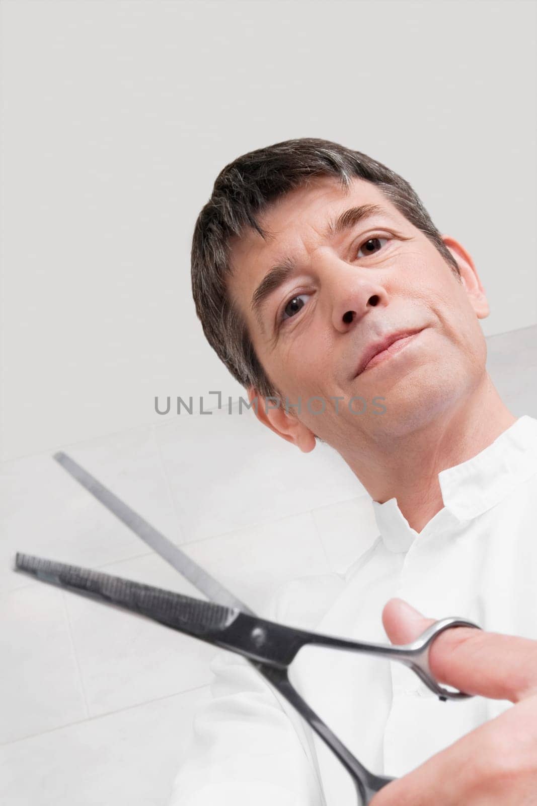 Vet holding scissors