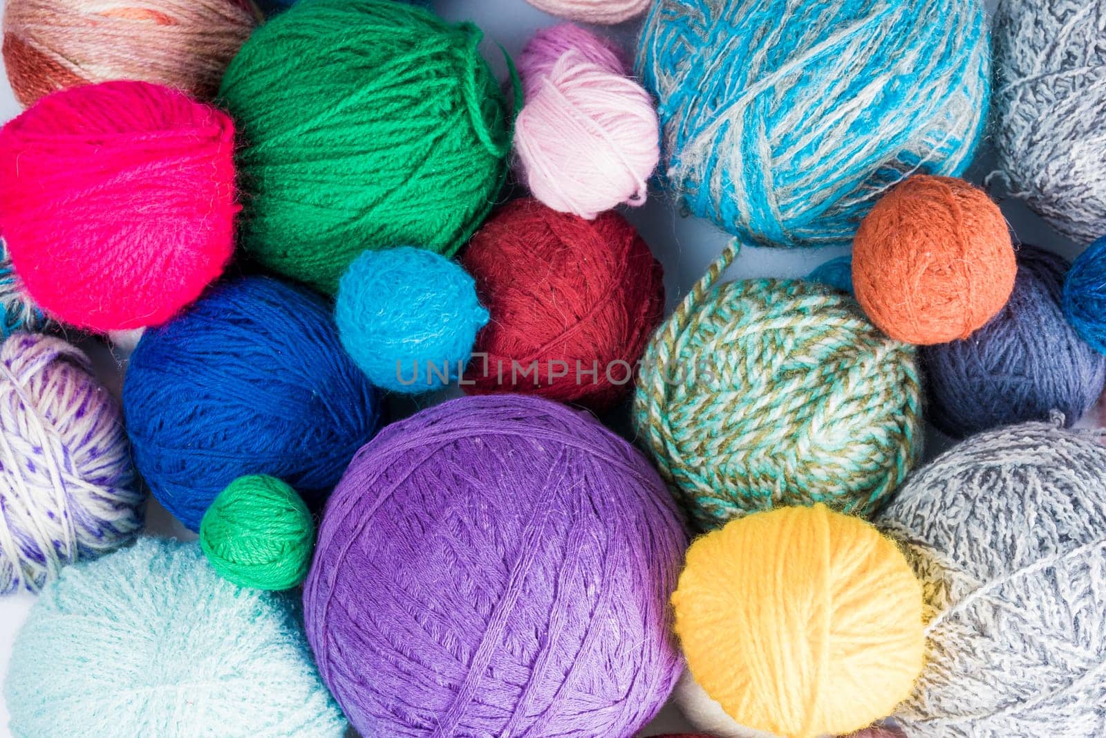 wool yarn ball. Colorful threads for needlework. Colorful fabric texture background