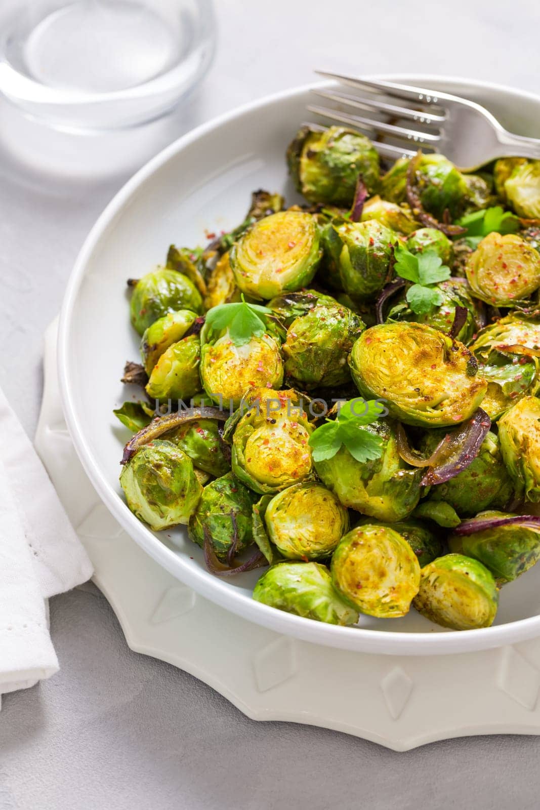 Baked Green Brussels Sprouts with honey and Parmesan cheese.