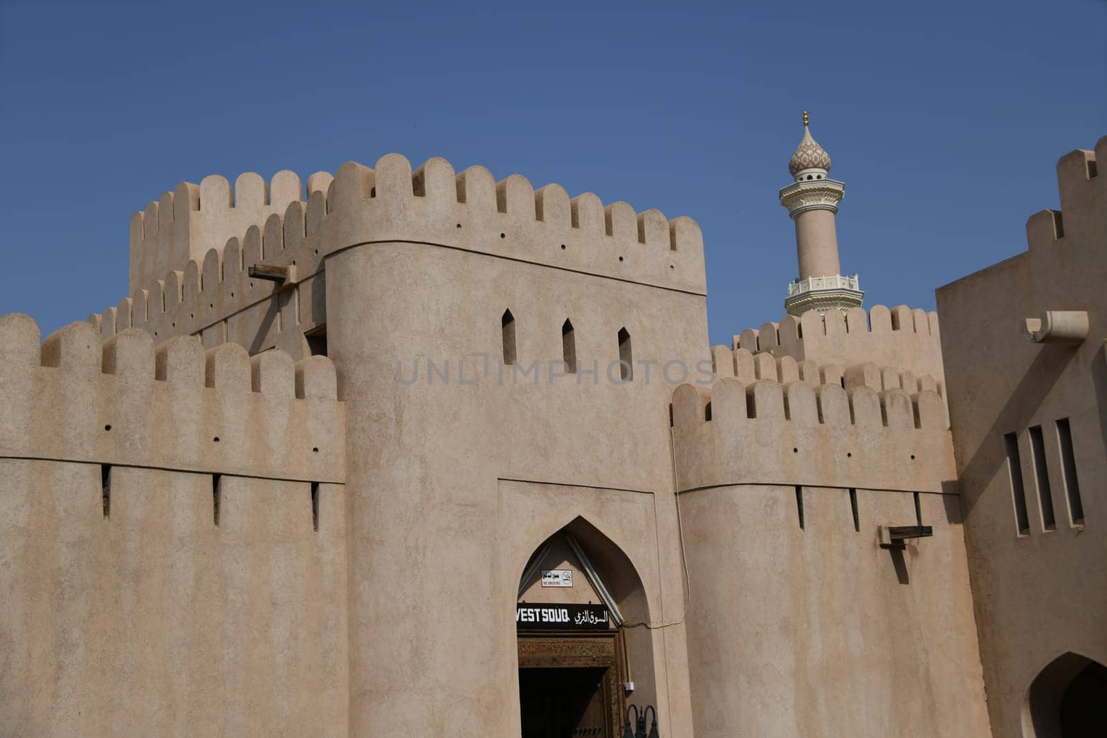 The West Souq by the large fortress Fort Nizwa is located on the edge of the Hajar Mountains in the oasis city in Oman and is very popular with tourists.
