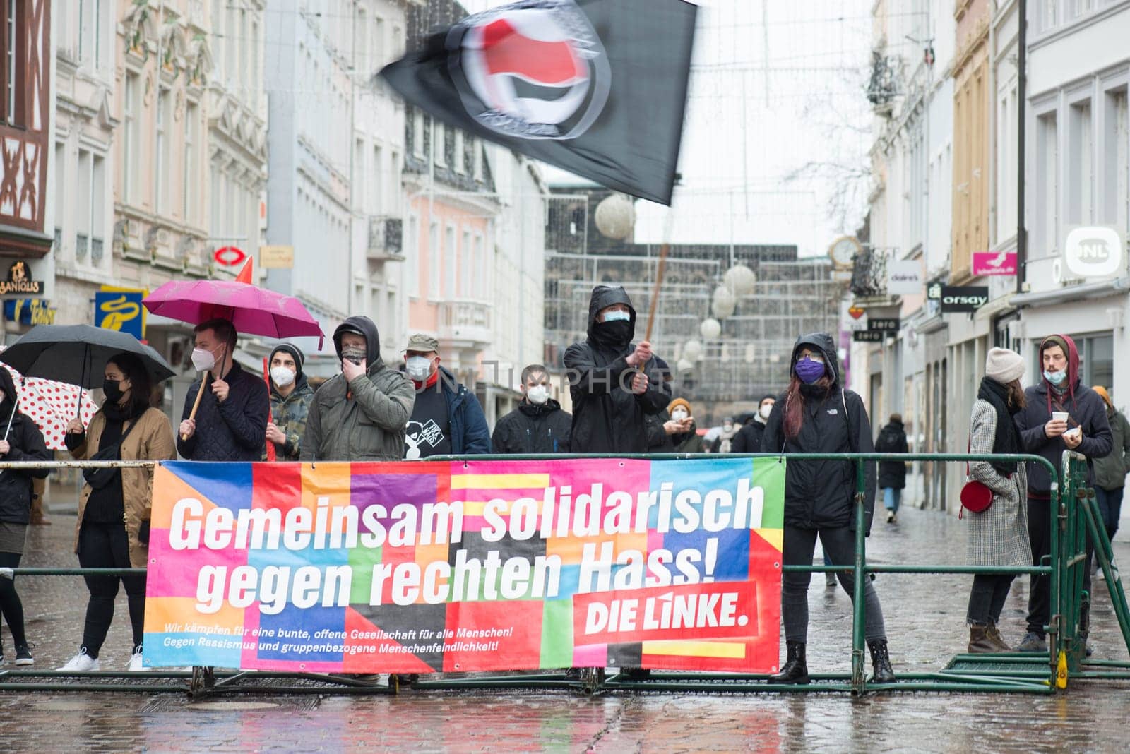 Demonstration in Trier on the 20.01.2021 against the covid-19 regulations in Germany, protest of the Antifa and the radical left wing against corona deniers