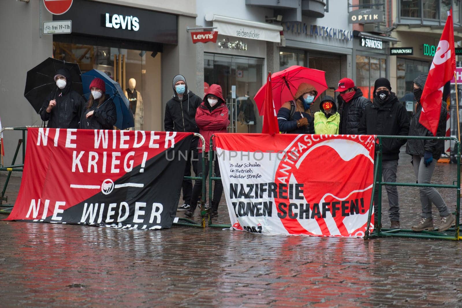 Demonstration in Trier on the 20.01.2021 against the covid-19 regulations in Germany, protest of the Antifa and the radical left wing against corona deniers