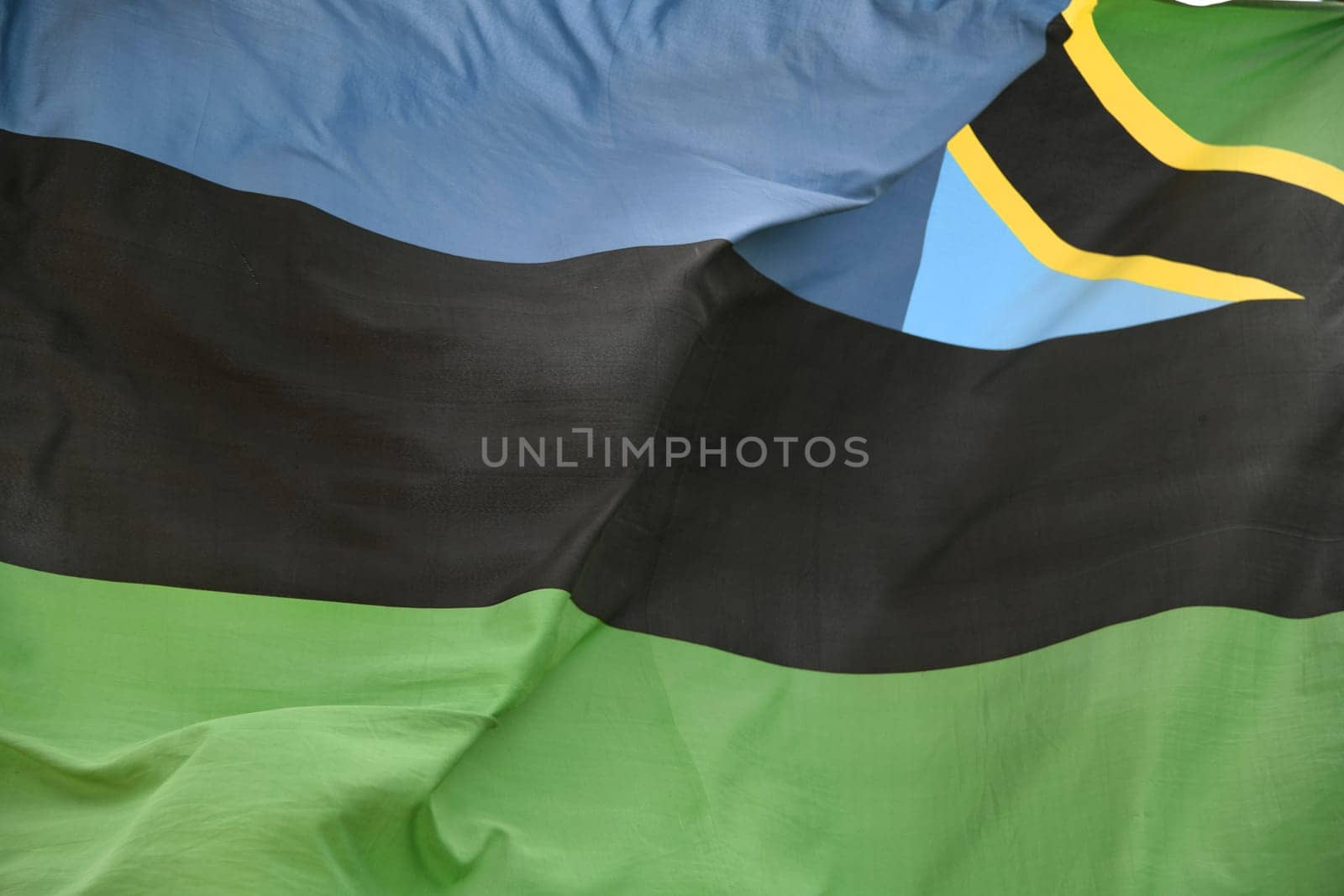 In the wind the national flag,banner of the island of Zanzibar after the union with Tanzania since January 10,2005. The blue represents the Indian Ocean.