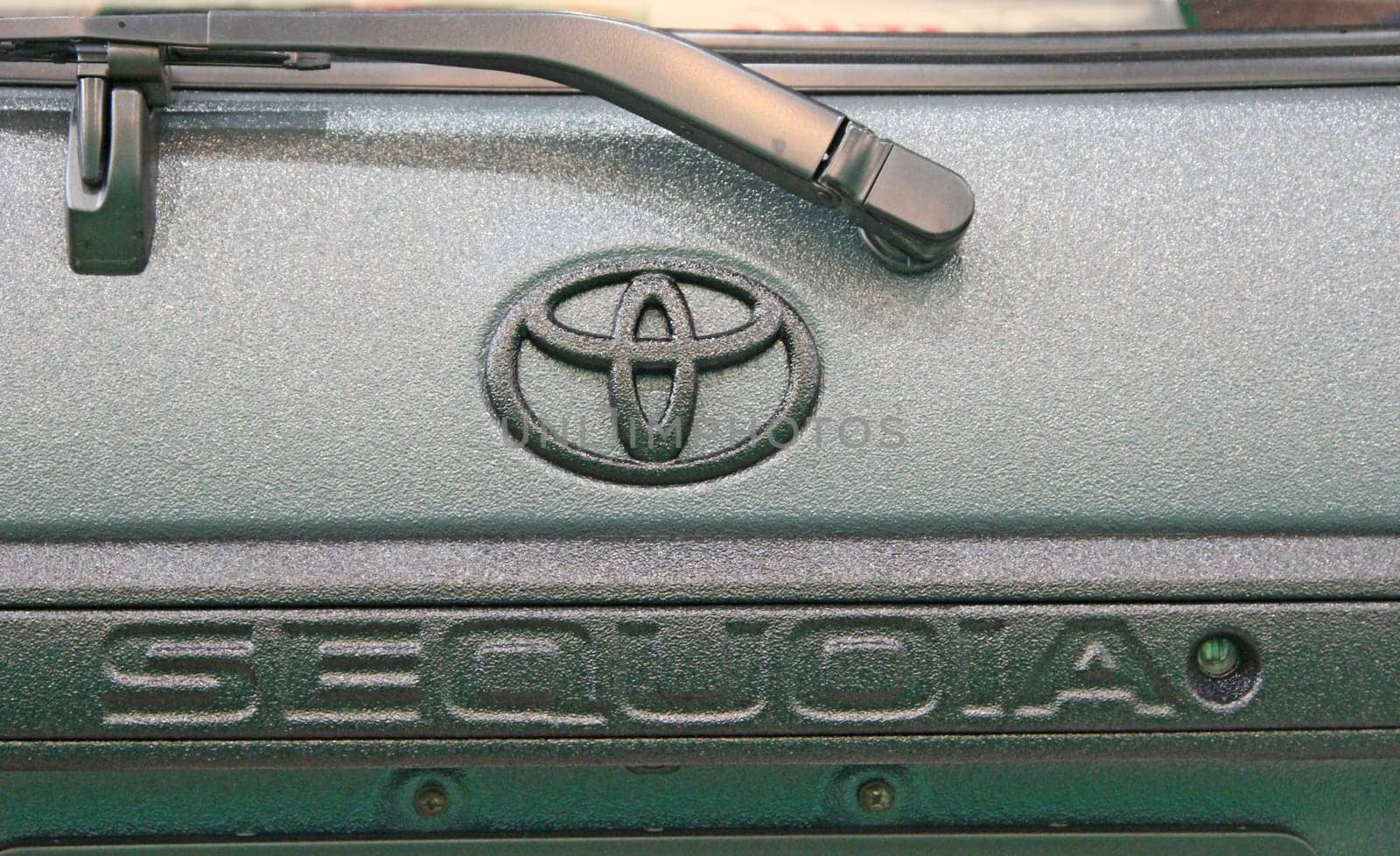Logo of Toyota Sequoia and windscreen wiper. Modern Toyota car is presented at exhibition in Kiyv. Japanese brand auto Toyota. Sign of Toyota