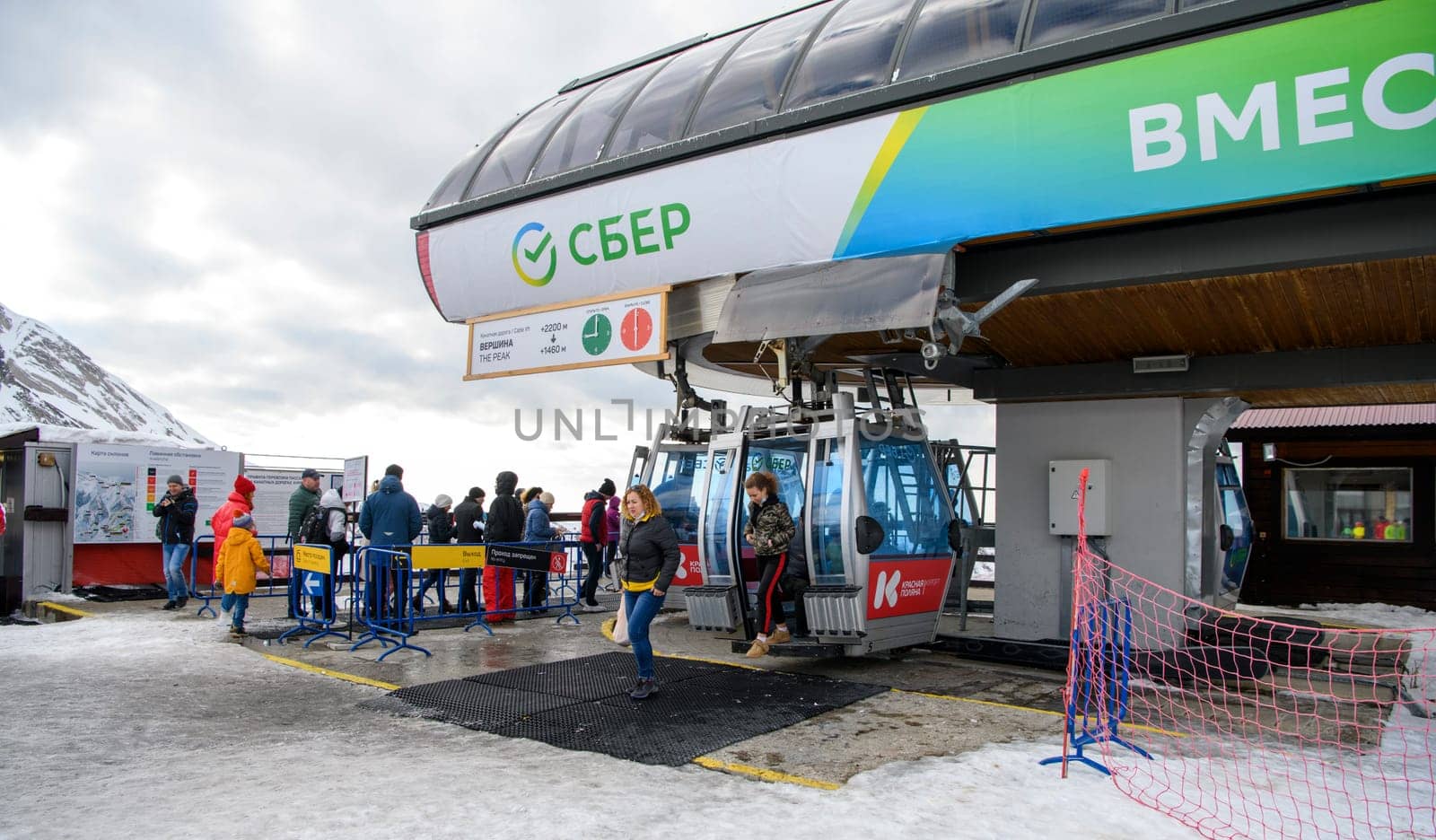Sochi  Russia - January 02  2021: Skiers climb the cable car at the Krasnaya Polyana ski resort