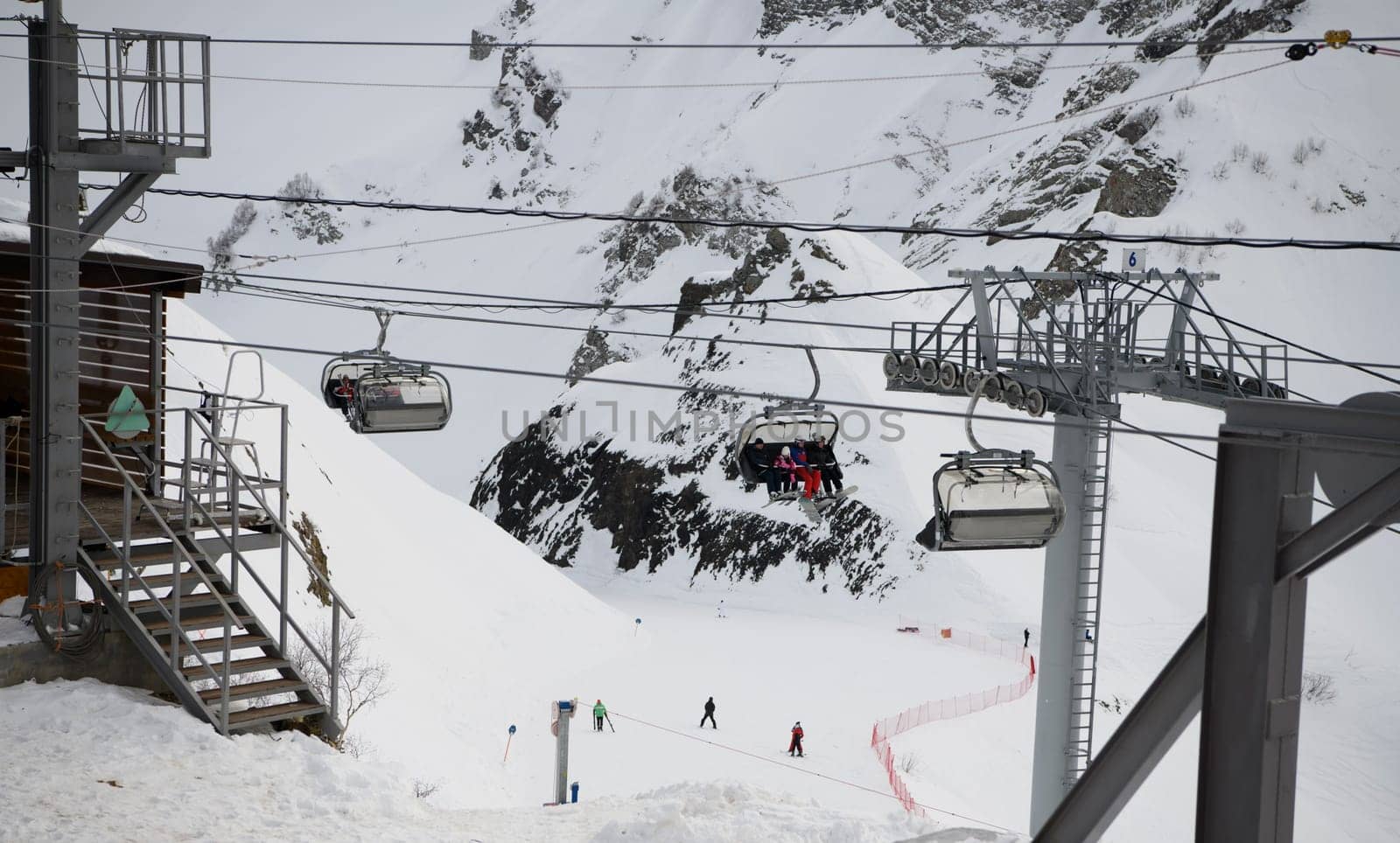 Sochi  Russia - January 02  2021: Skiers climb the cable car at the Krasnaya Polyana ski resort