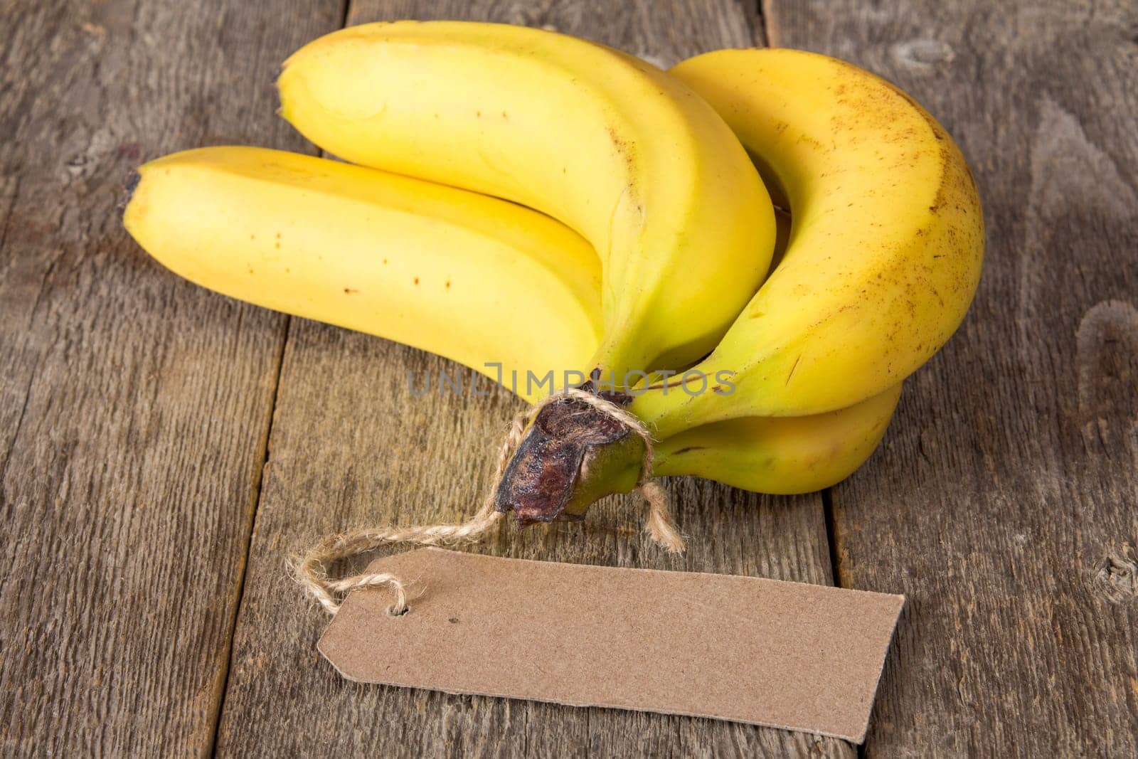 Bunch of bananas with blank price tag