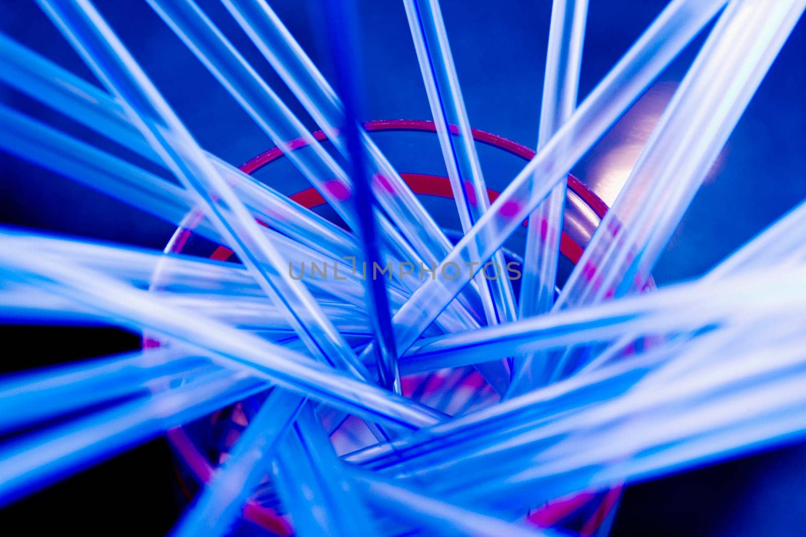 Close-up of drinking straws in a sink