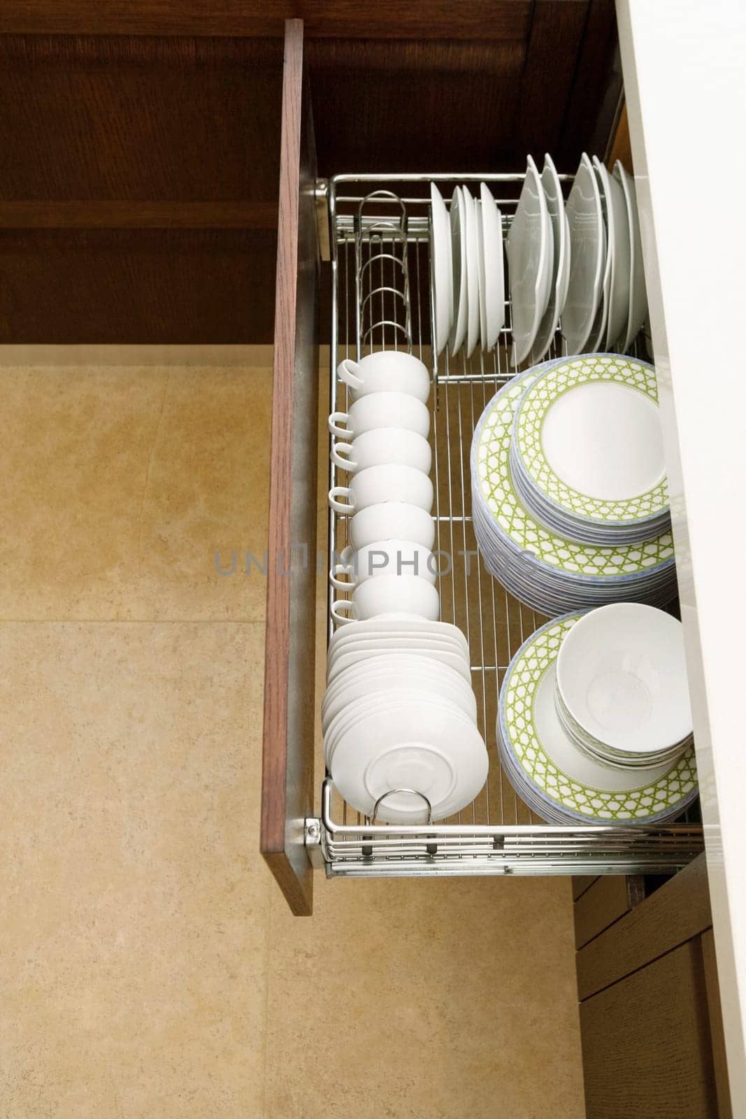 High angle view of potteries in a kitchen cabinet