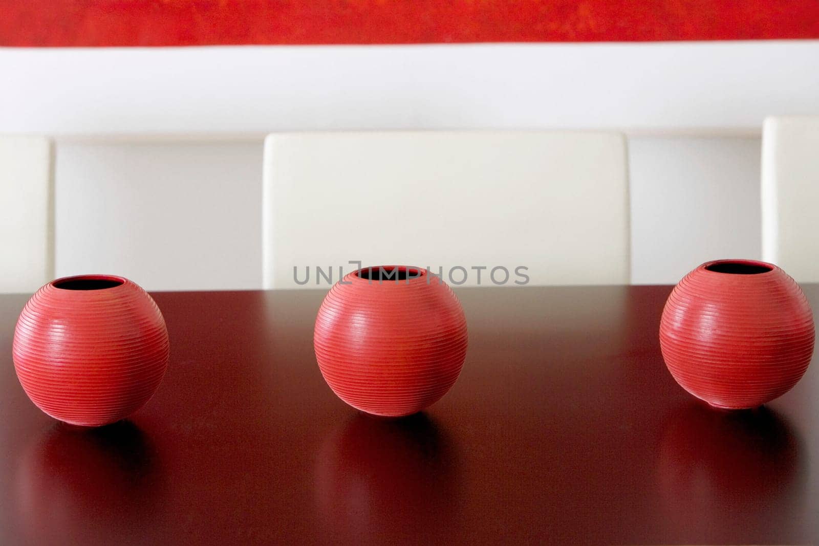 Close-up of three ceramic pots on a table