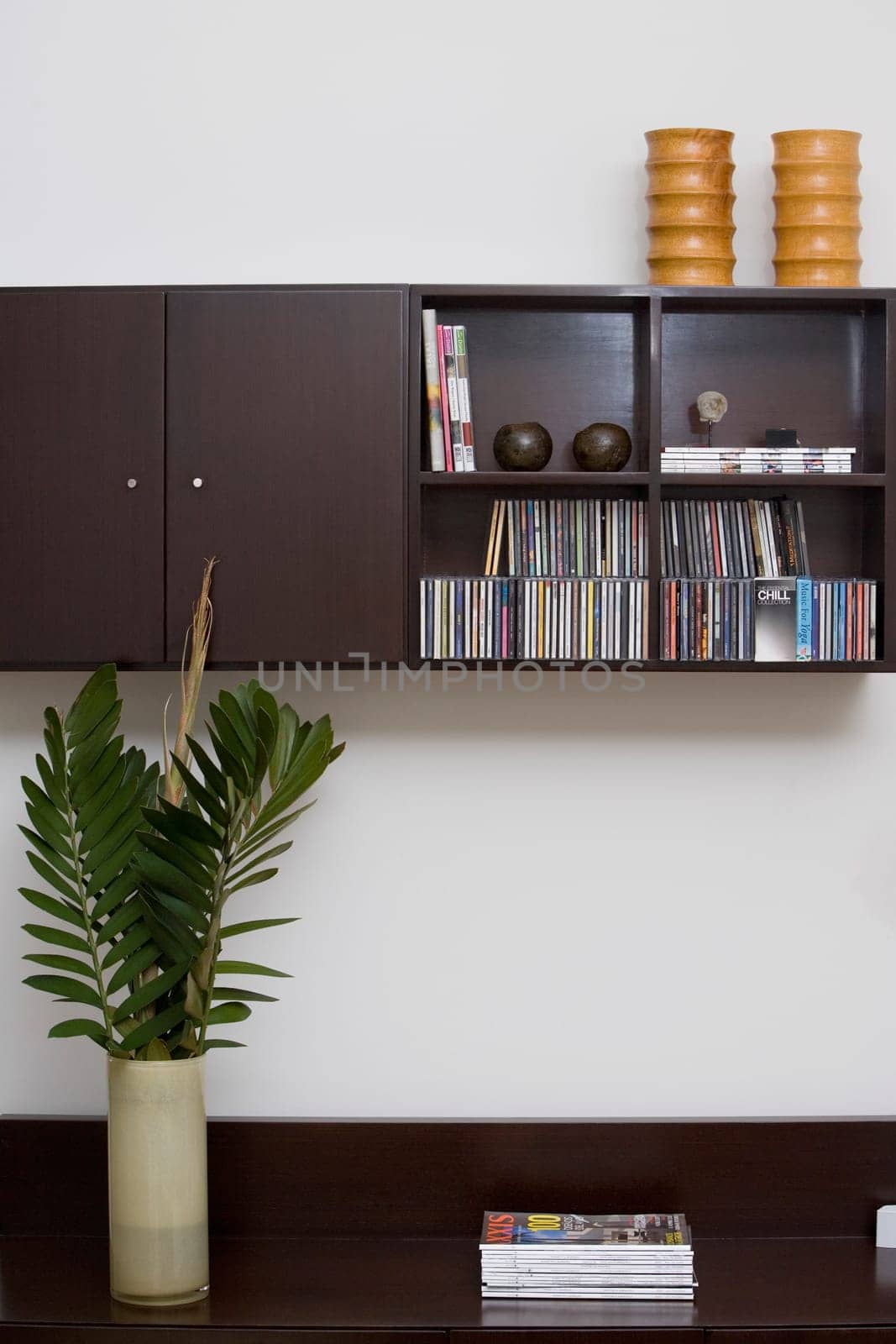 Magazines and a vase on a coffee table
