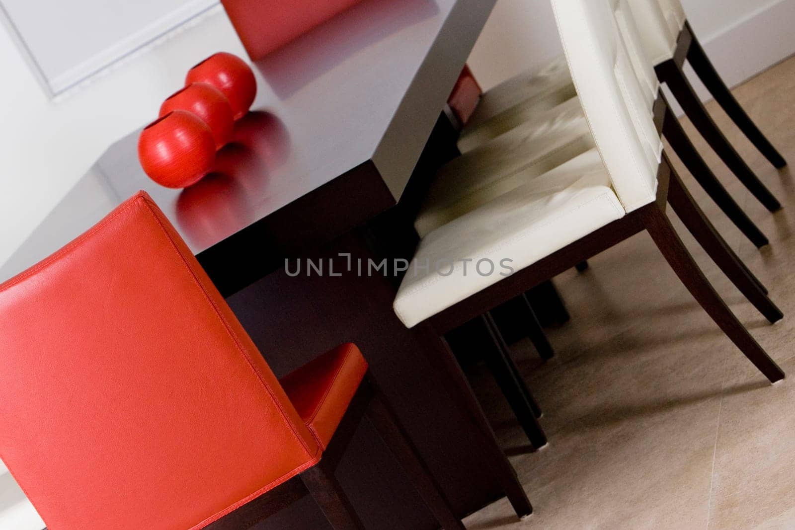 Decorative urns on a dining table in a dining room