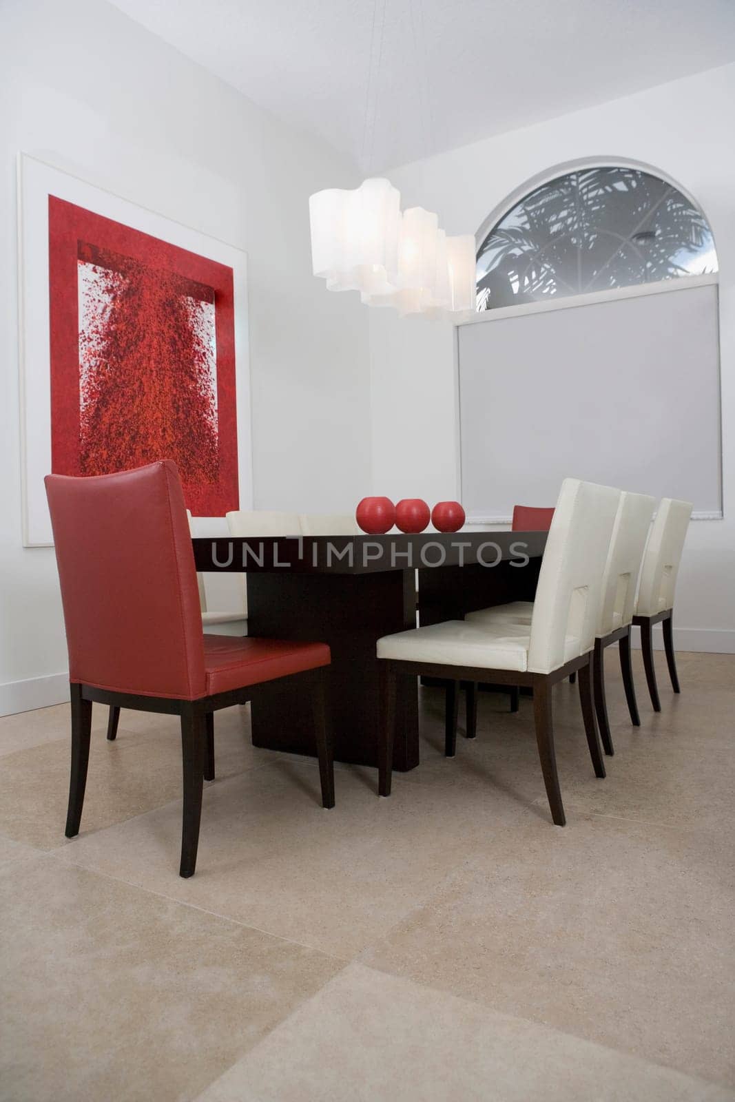 Decorative urns on a dining table in a dining room