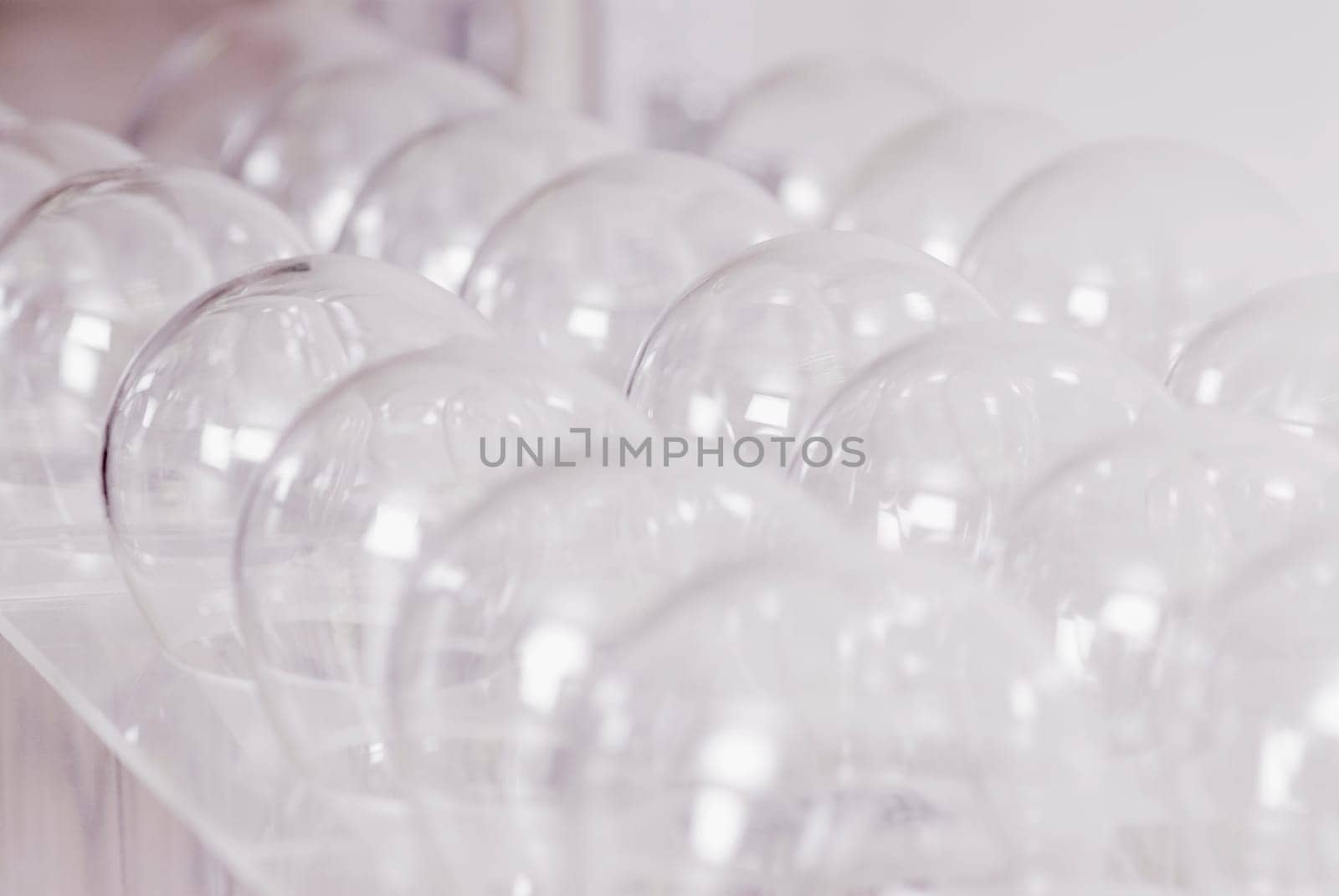 Close-up of flasks on a rack