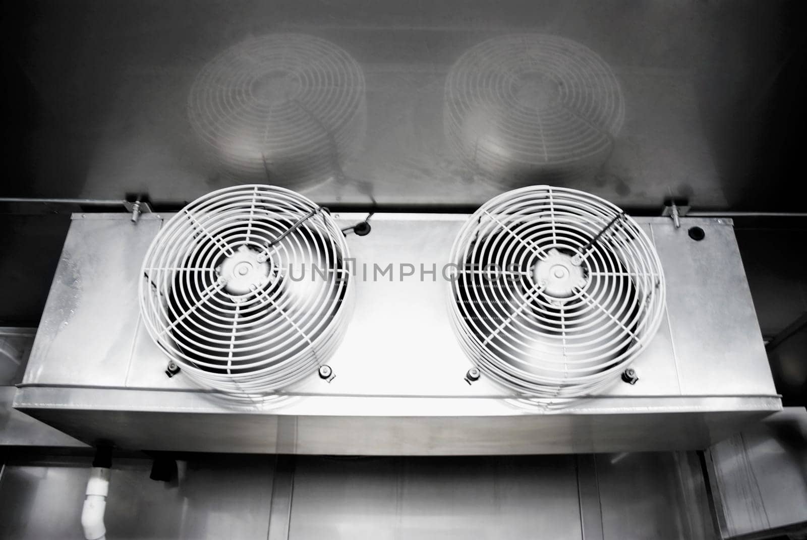 Low angle view of two exhaust fans in a laboratory