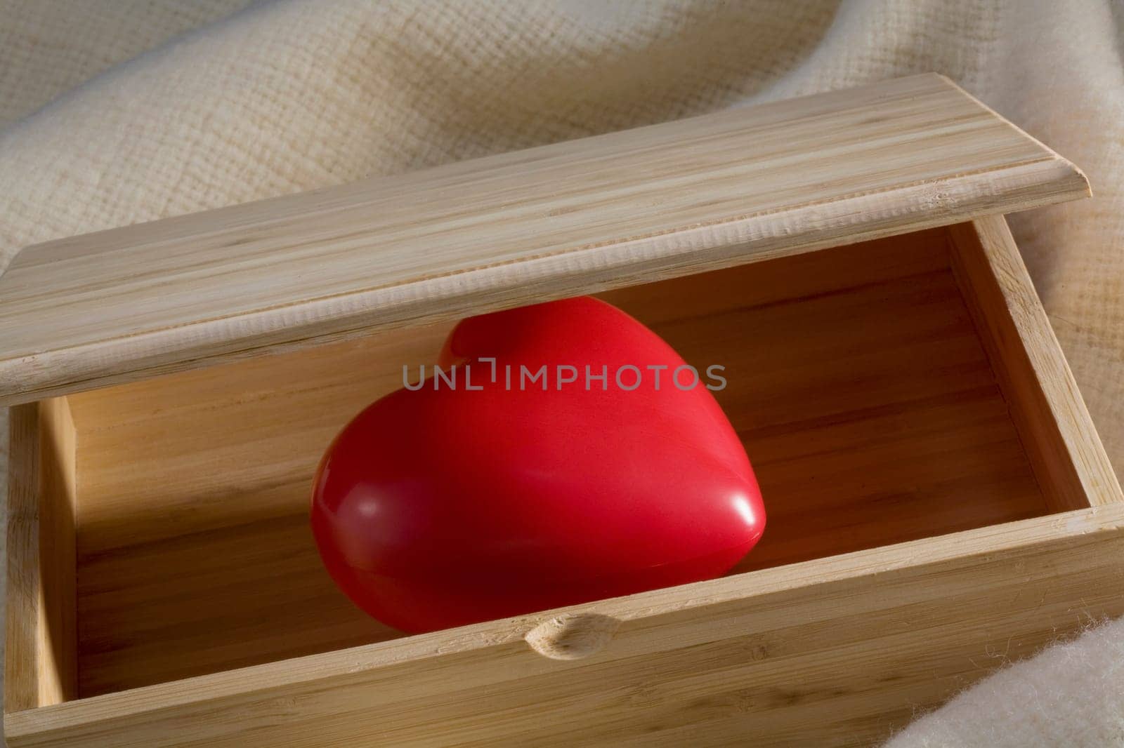 Close-up of a heart in a wooden box