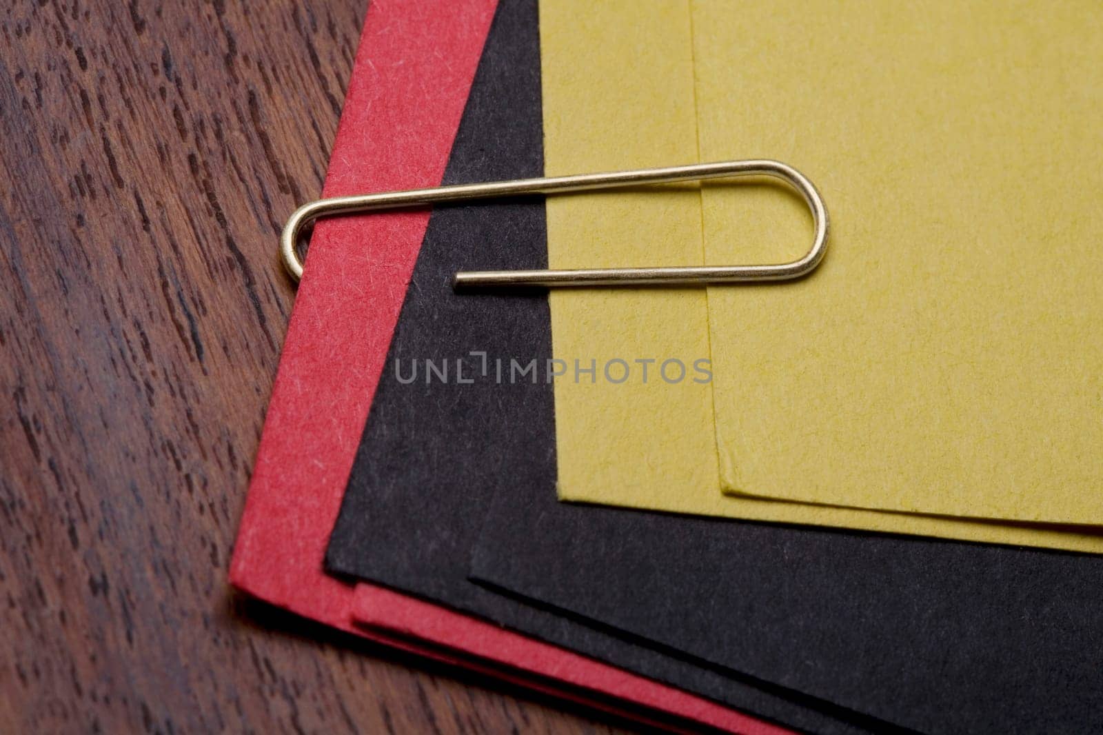 High angle view of a paper clip on files