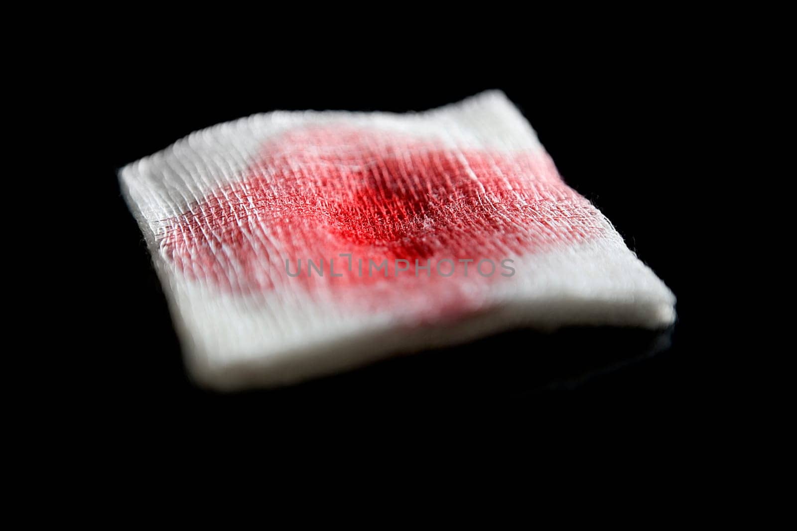 Close-up of a gauze with blood
