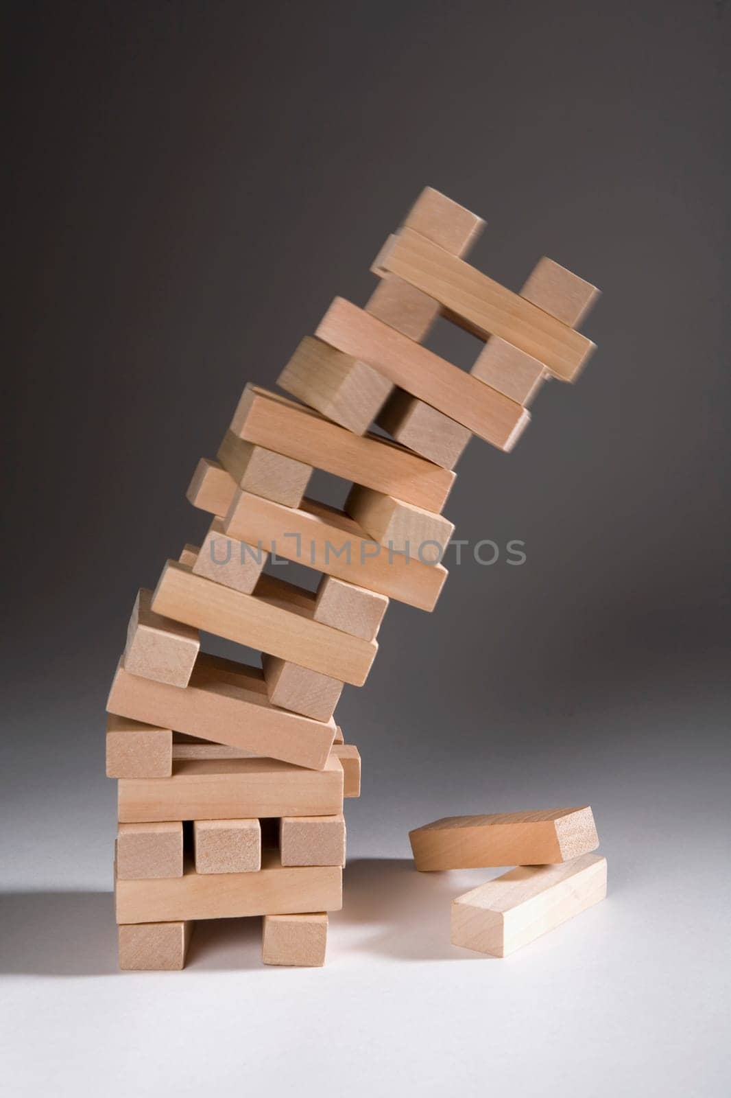 Close-up of a stack of falling wooden blocks