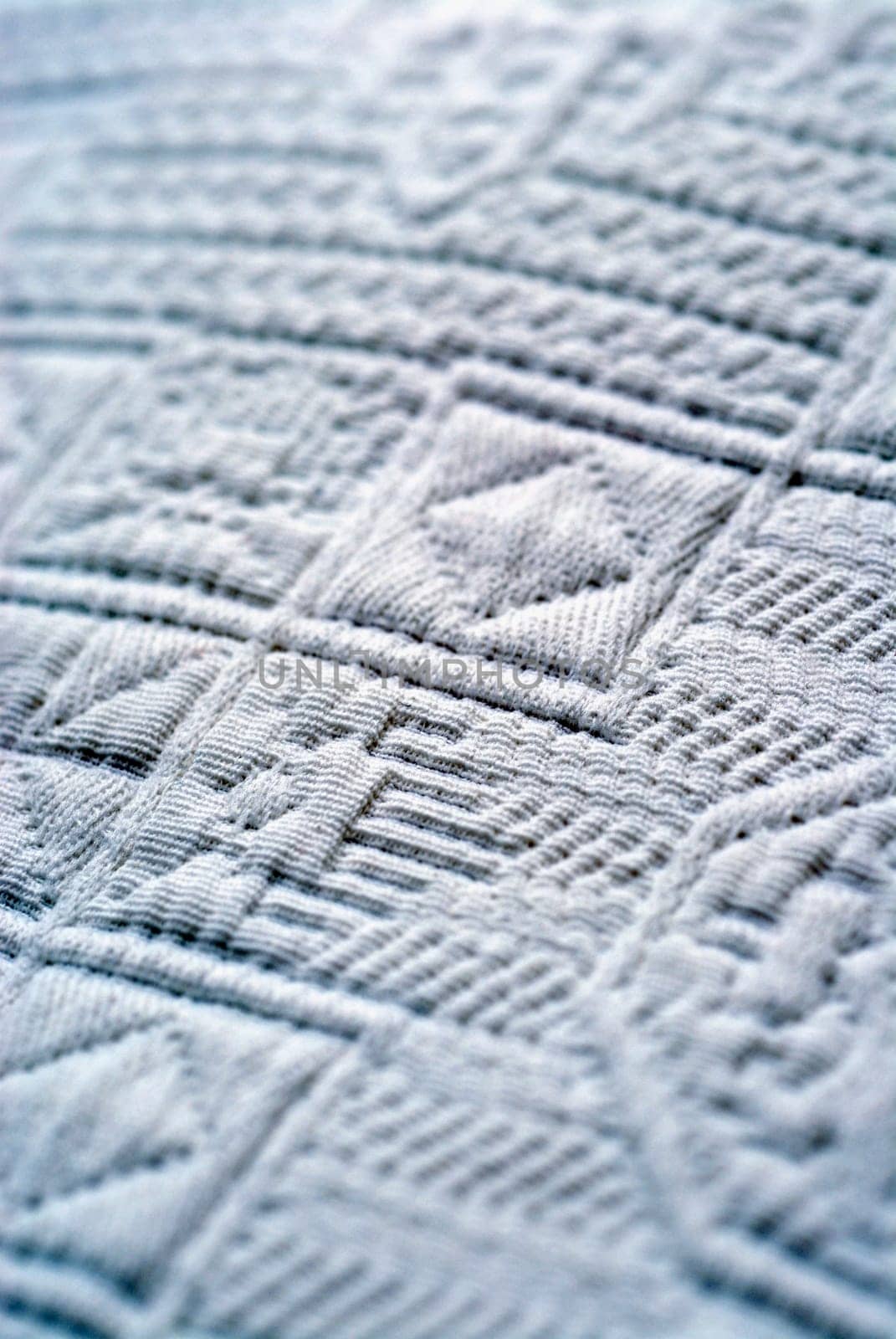 Close-up of an embossed design on fabric