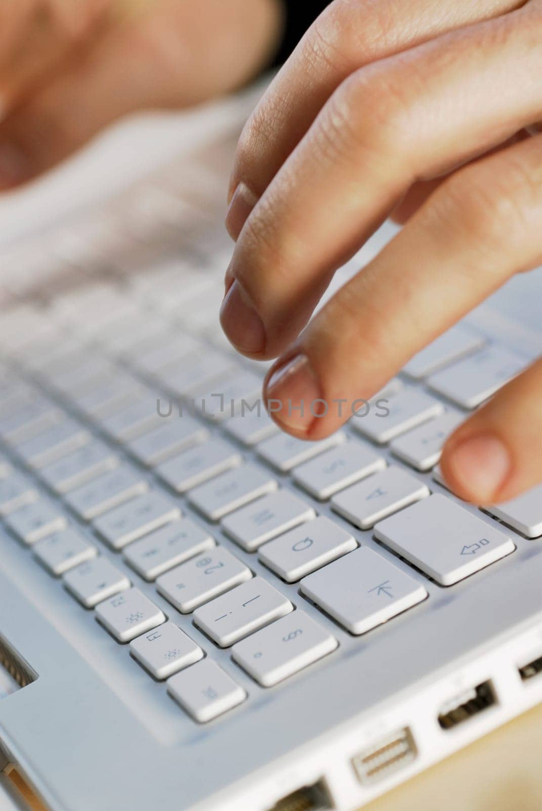 Close-up of a personŽs hand using a laptop