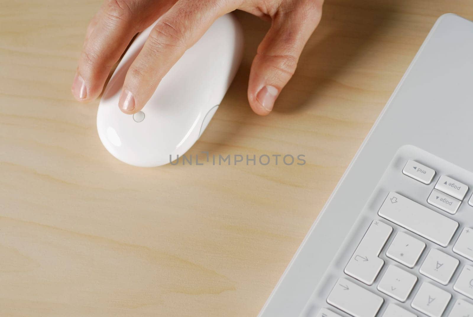 Close-up of a personŽs hand using a computer mouse