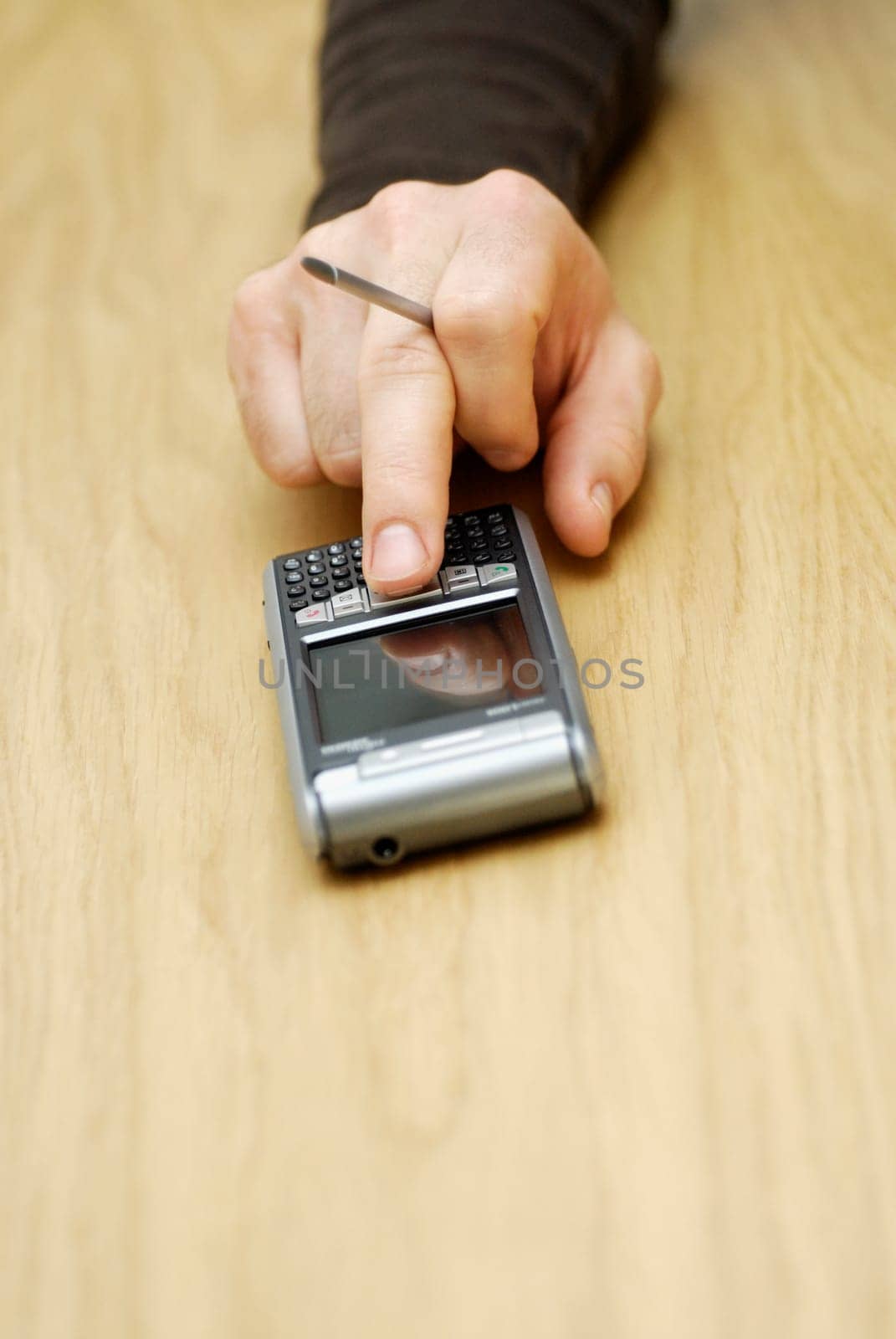 Close-up of a personŽs hand operating a mobile phone