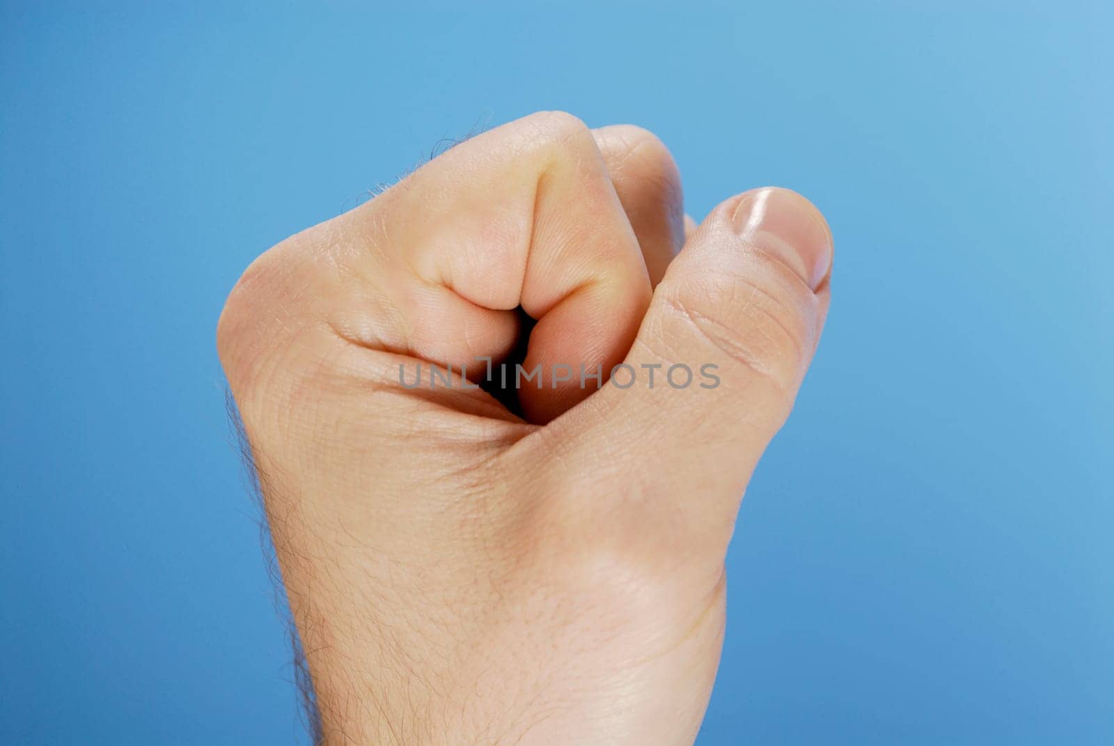 Close-up of a personŽs hand making a fist