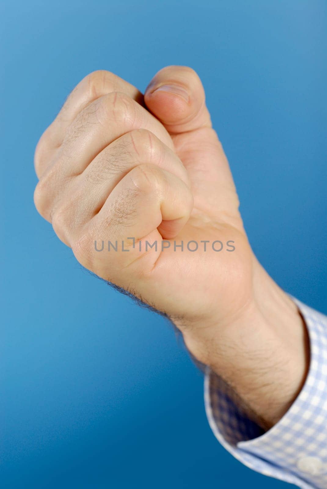Close-up of a manŽs hand making a fist