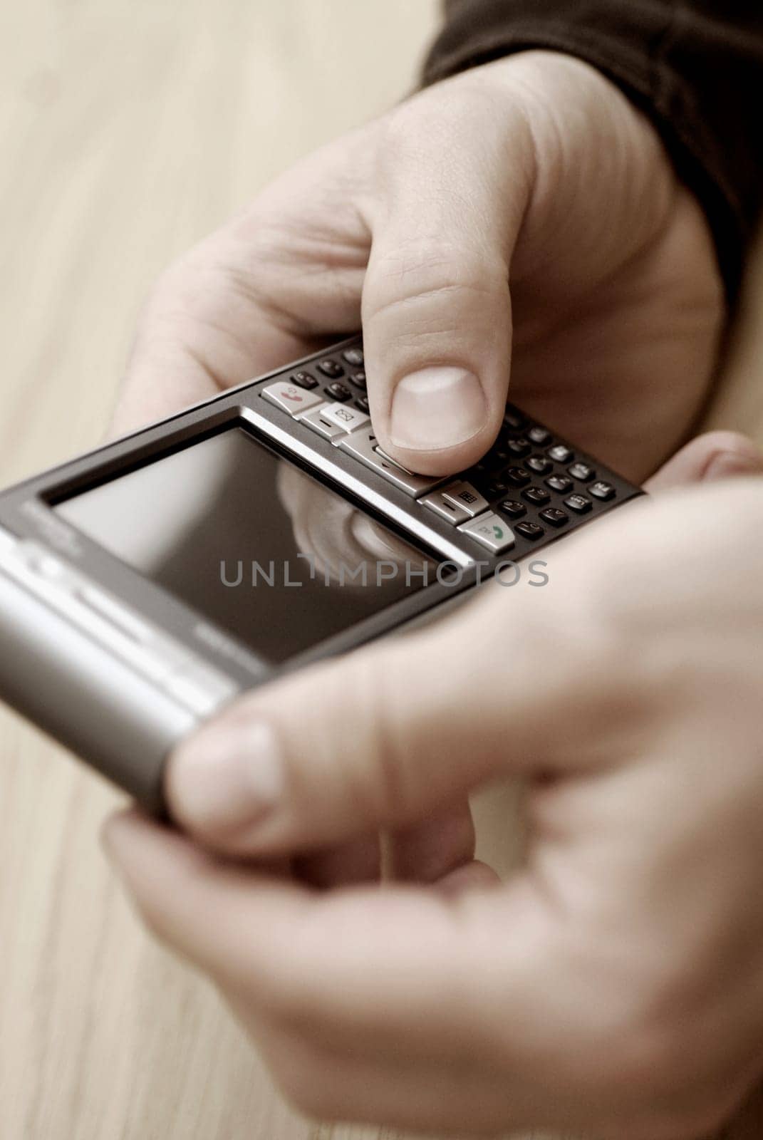 Close-up of a personŽs hand operating a mobile phone