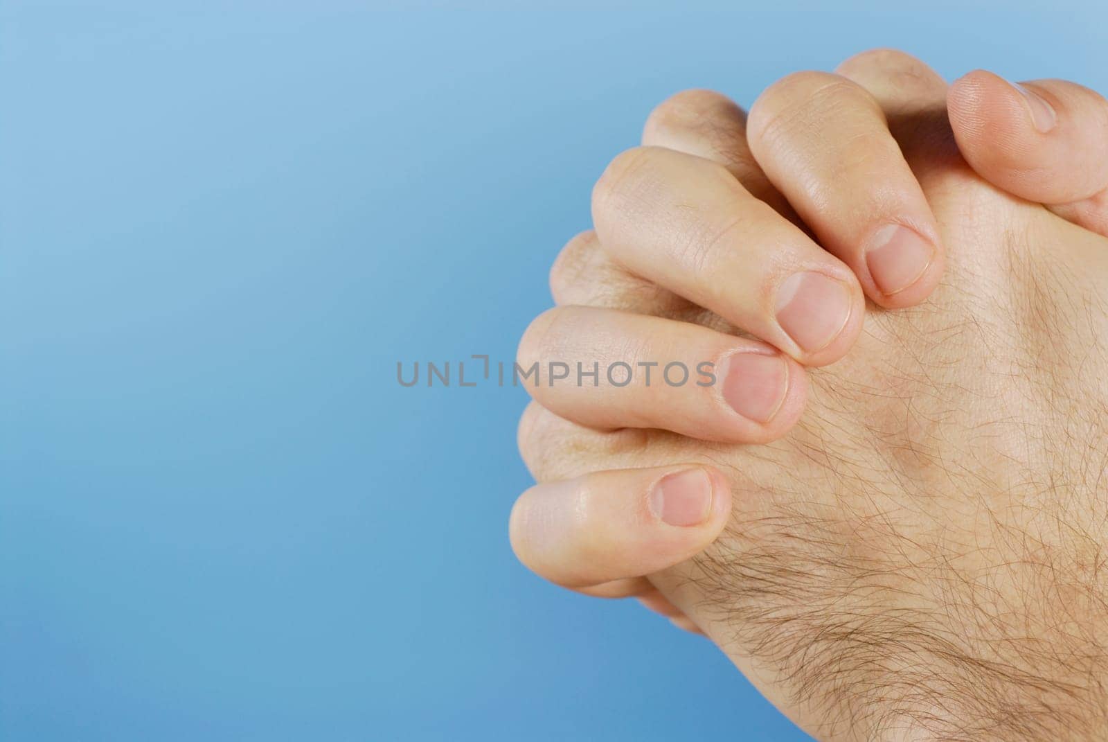 Close-up of personŽs hands clasped