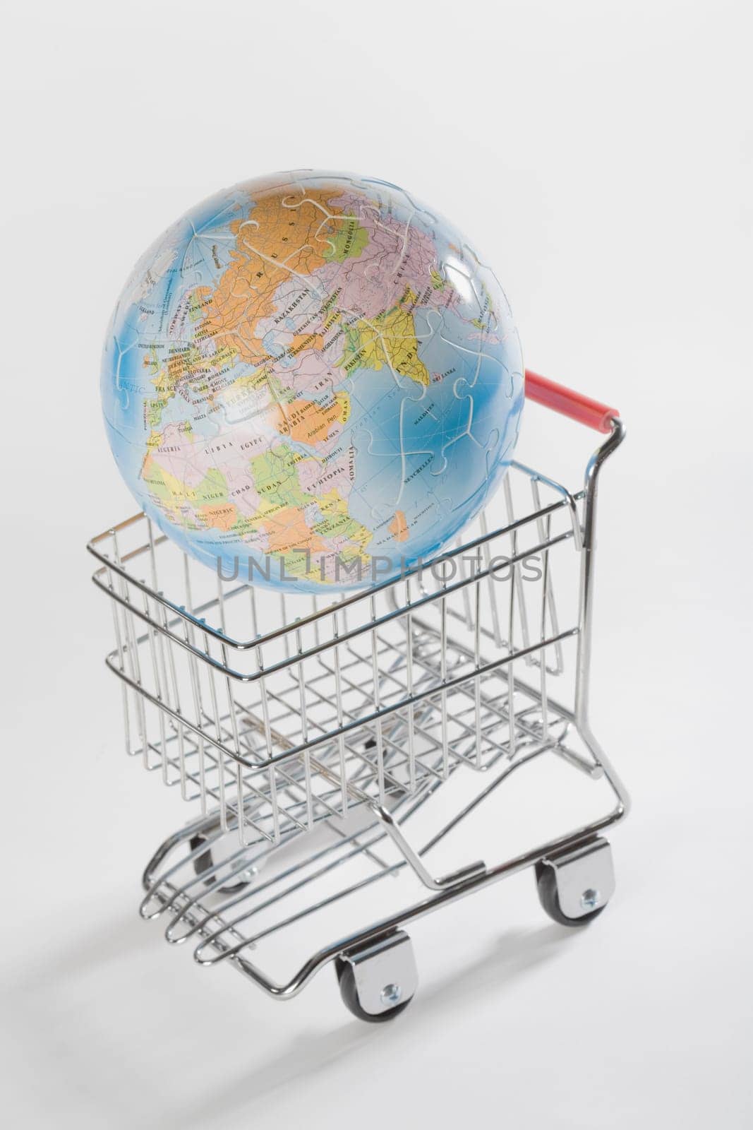 Close_up of a globe in a shopping cart