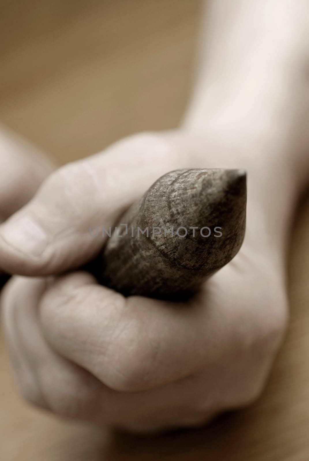 Close-up of a personŽs hand using a wood planer