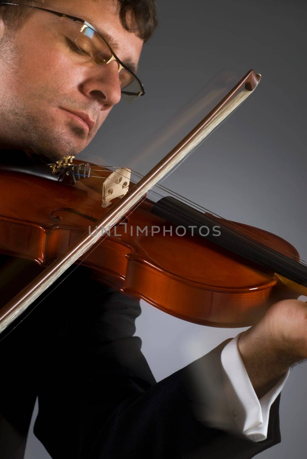 Close-up of a musician playing a violin