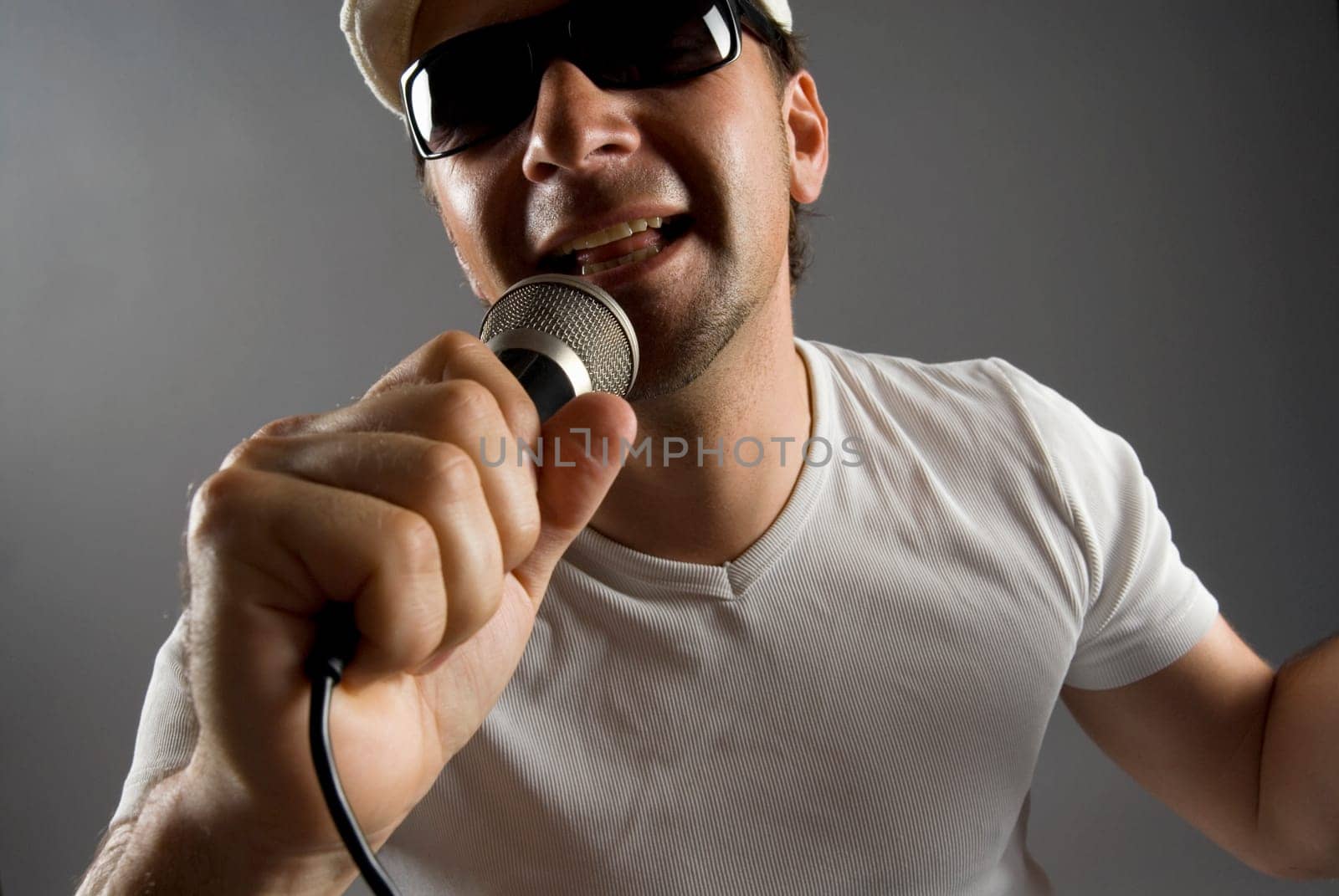 Close-up of a male singer singing