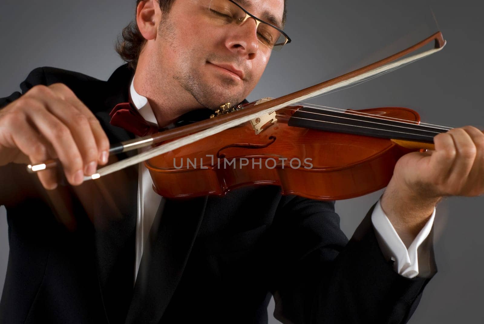 Close-up of a musician playing a violin