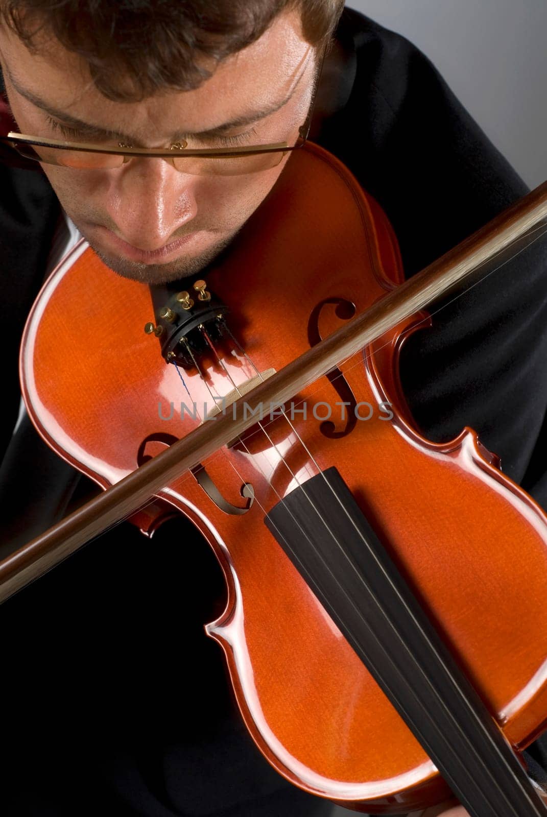 Close-up of a musician playing a violin